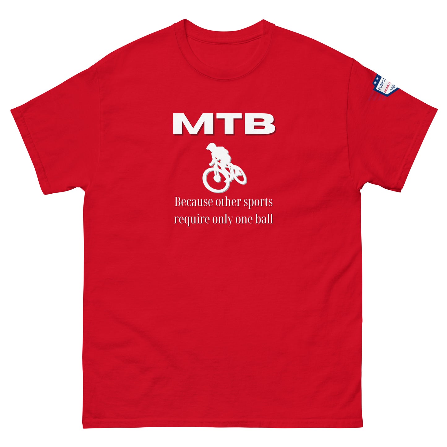 Front view of red t-shirt with bold white "MTB", jumping cyclist graphic, "Because other sports require only one ball", flag on sleeve
