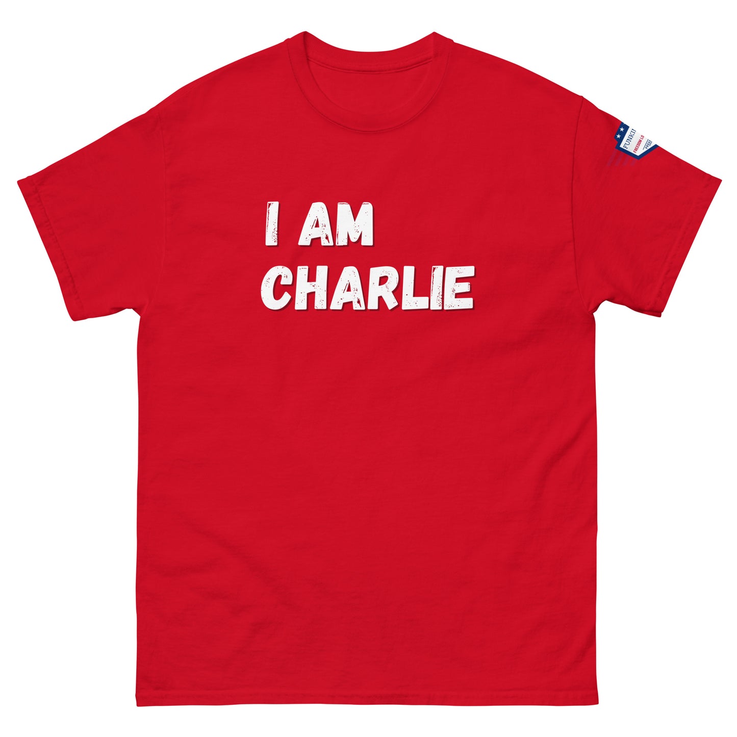 Red unisex tee front view, white "I AM CHARLIE" graphic, flag on sleeve