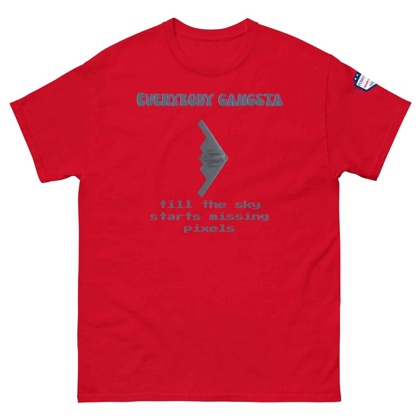 Front view of red "Everybody Gangsta till the sky starts missing pixels" tee with bomber graphic and US flag on sleeve