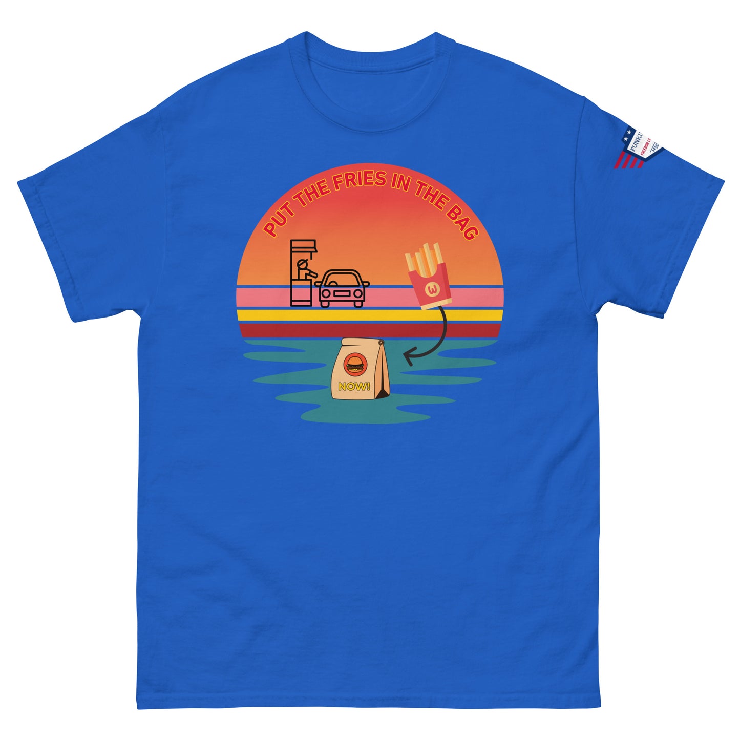 Front view of royal blue T-shirt sporting "PUT THE FRIES IN THE BAG" meme sunset drive-thru, fries, bag and US flag patch