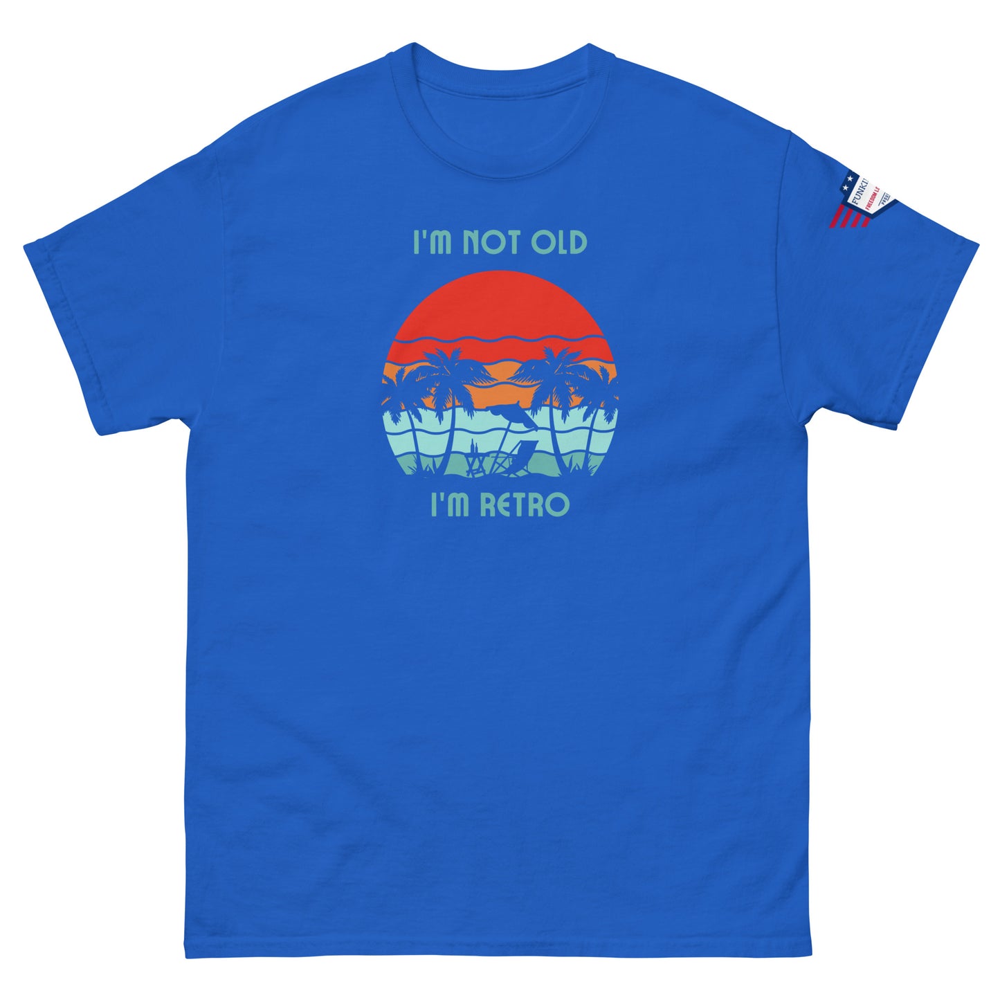 Front view of royal blue "I'm Not Old I'm Retro" unisex t-shirt, retro palms print and flag sleeve