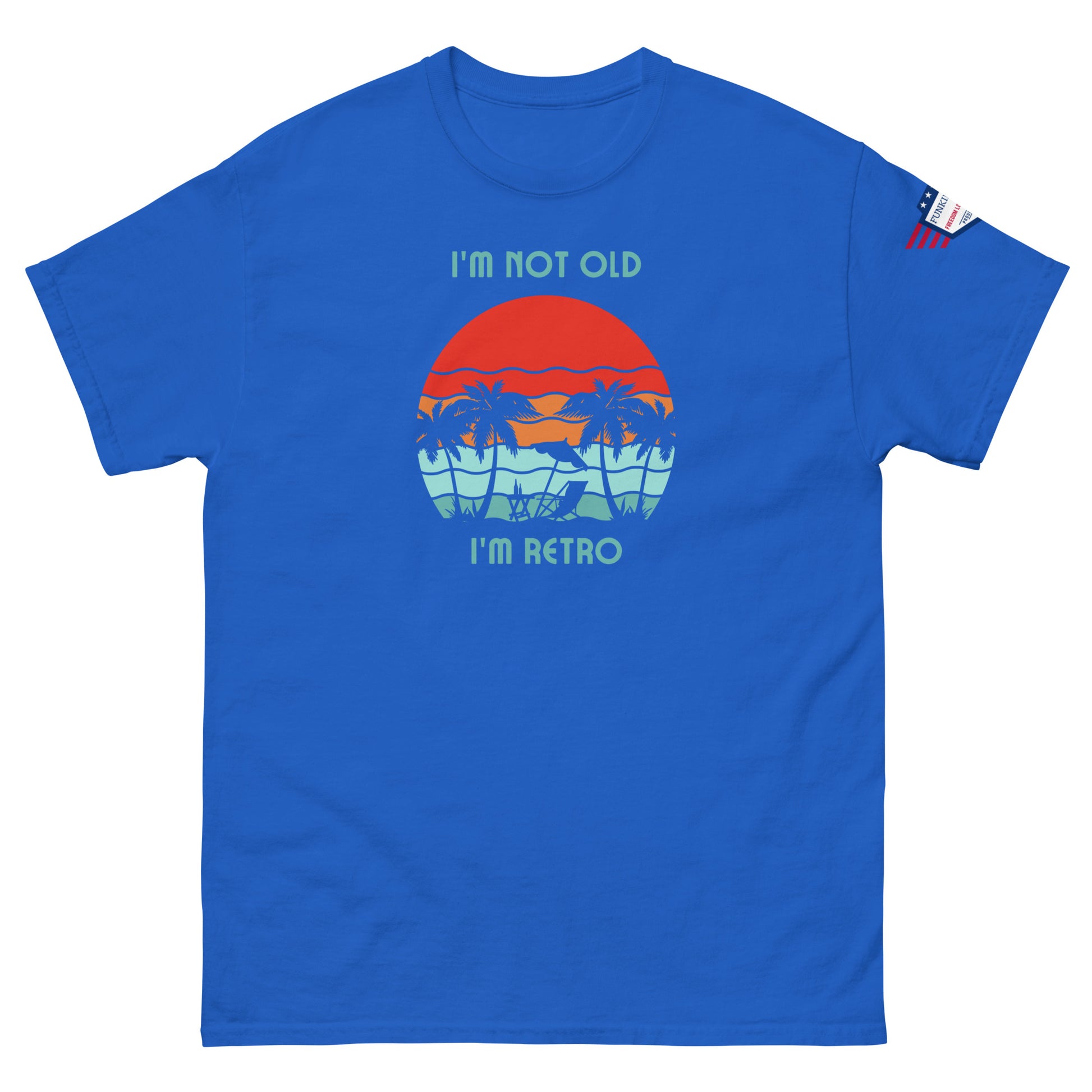 Front view of royal blue "I'm Not Old I'm Retro" unisex t-shirt, retro palms print and flag sleeve