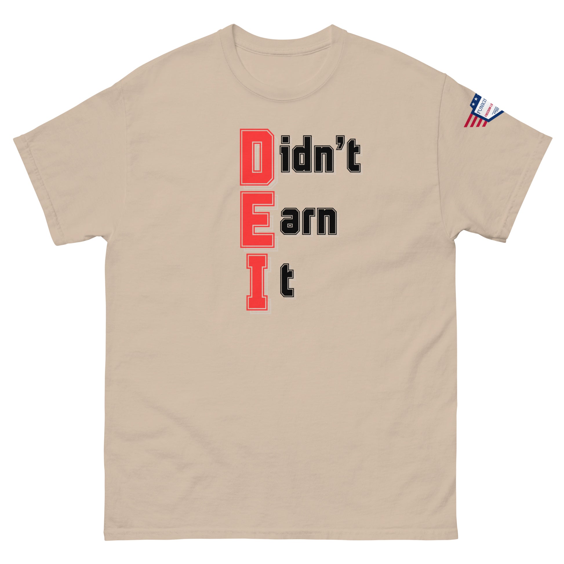 Front view of tan unisex t-shirt with "Didn't Earn It" vertical red-black design, stars-and-stripes sleeve patch