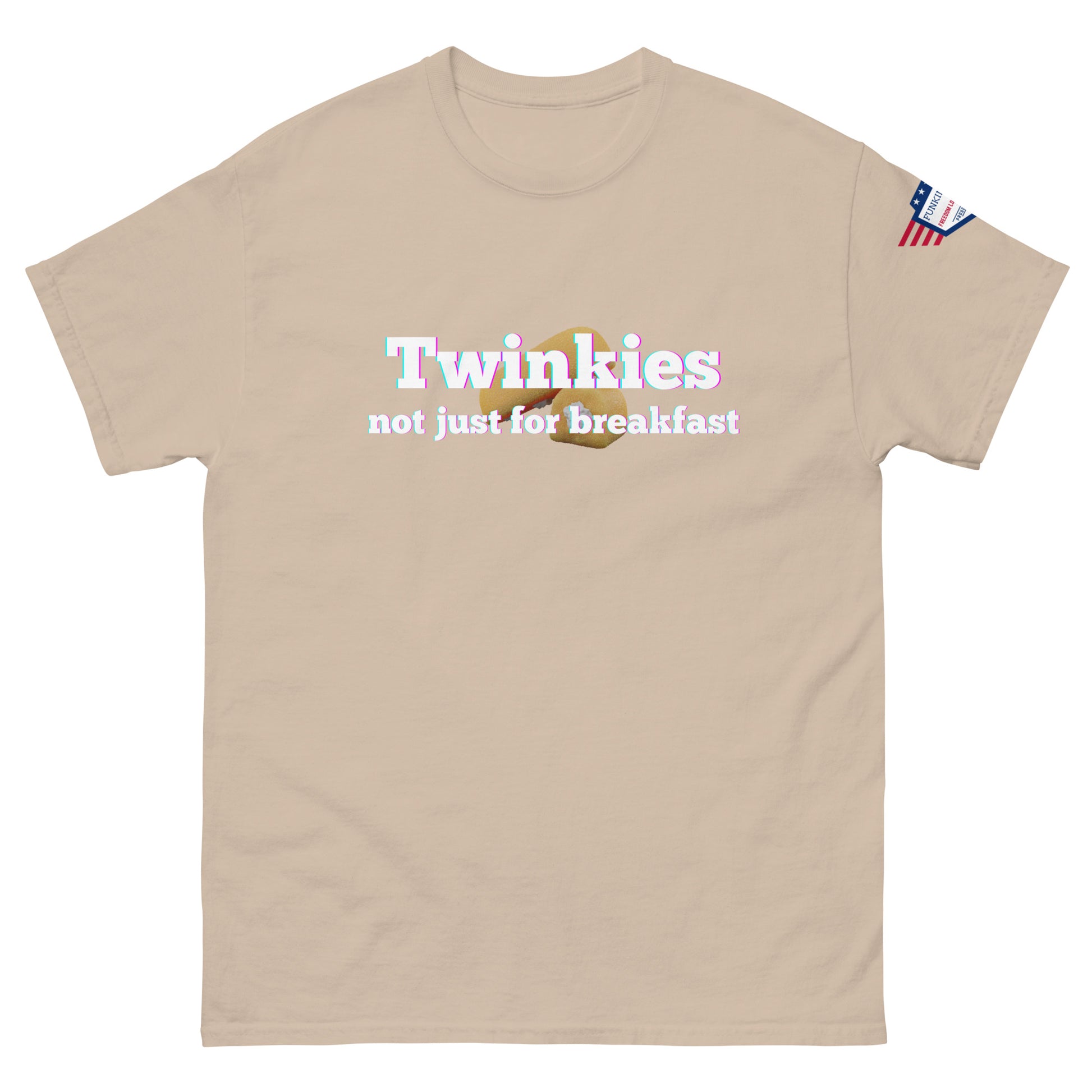 Front view of sand beige unisex tee with "Twinkies not just for breakfast" and Twinkie graphic, American flag on sleeve