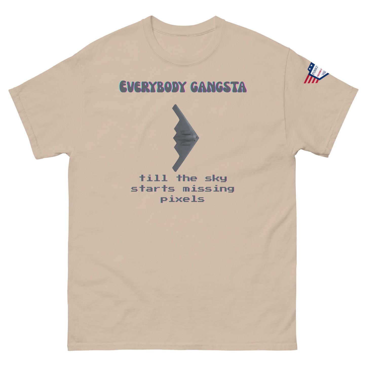 Front view of sand "Everybody Gangsta till the sky starts missing pixels" tee with stealth graphic and US flag sleeve
