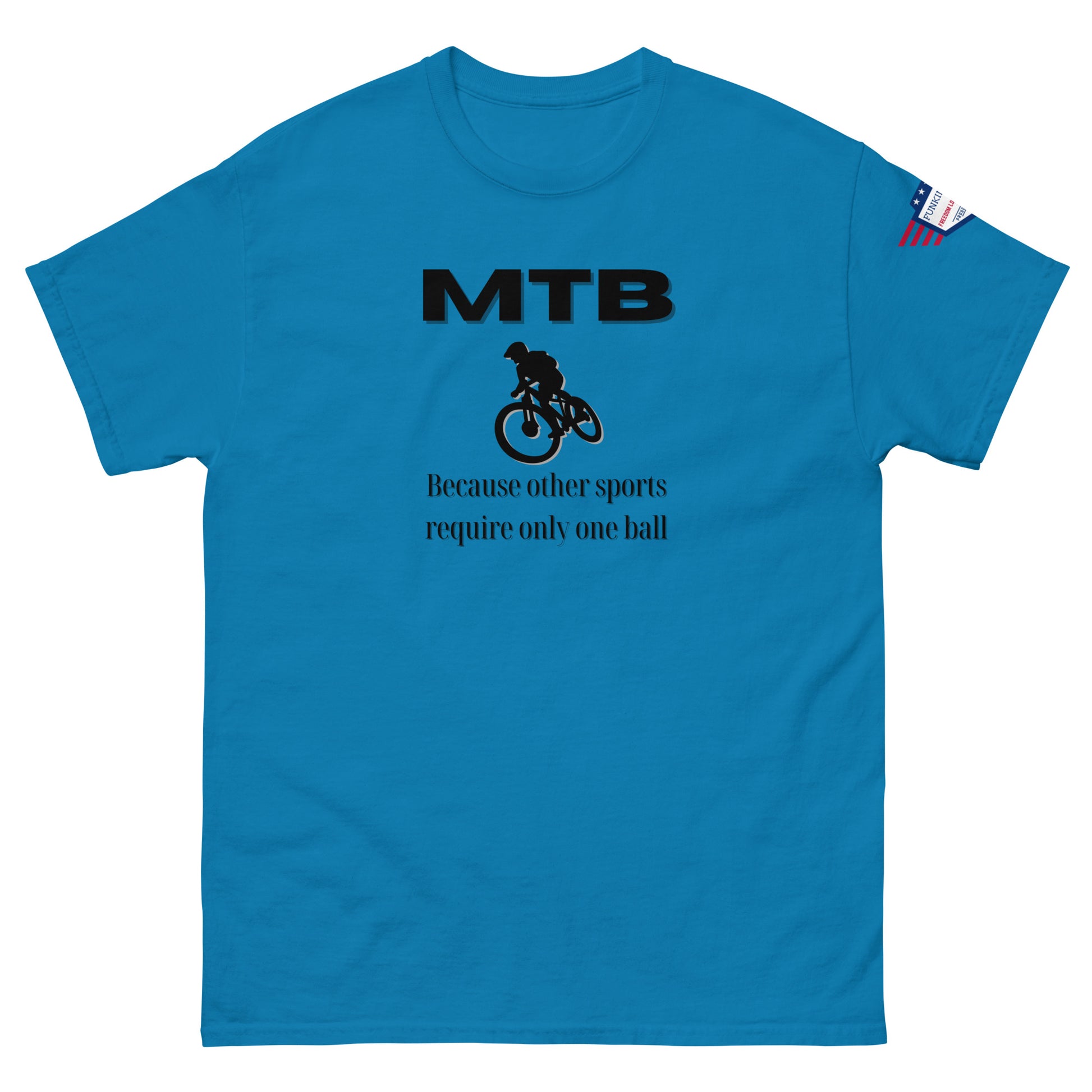 Front view of sky blue classic unisex tee with bold black "MTB" print, biker silhouette, and "Because other sports require only one ball" text