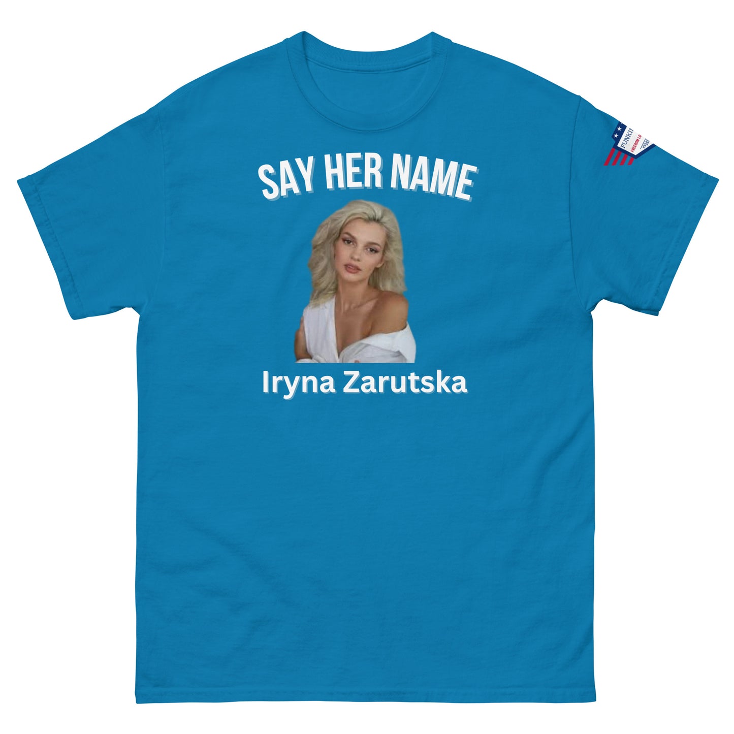 Front view of light blue "SAY HER NAME Iryna Zarzutska" meme tee, USA flag on sleeve