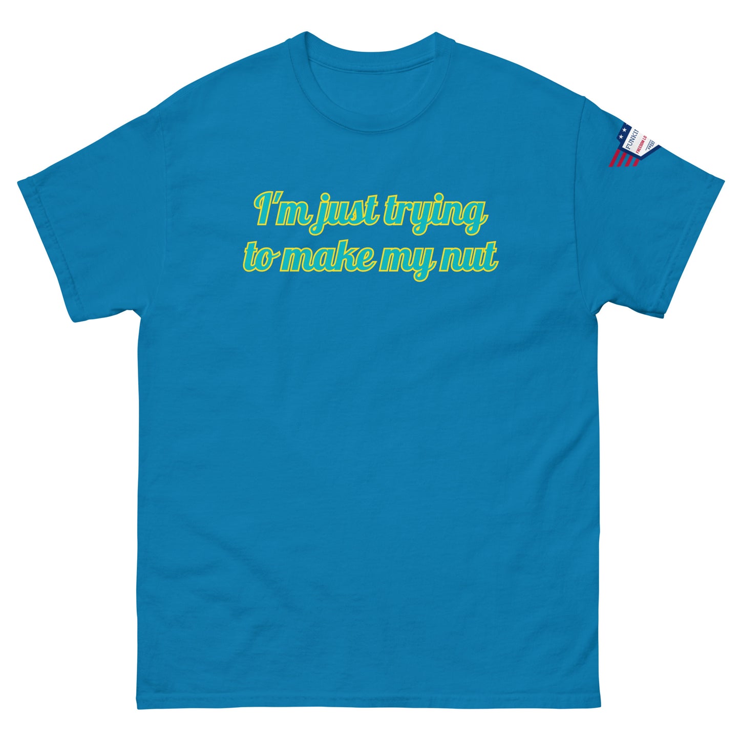 Front view of kelly green unisex tee with "I'm just trying to make my nut" in teal-yellow cursive print, US flag sleeve patch