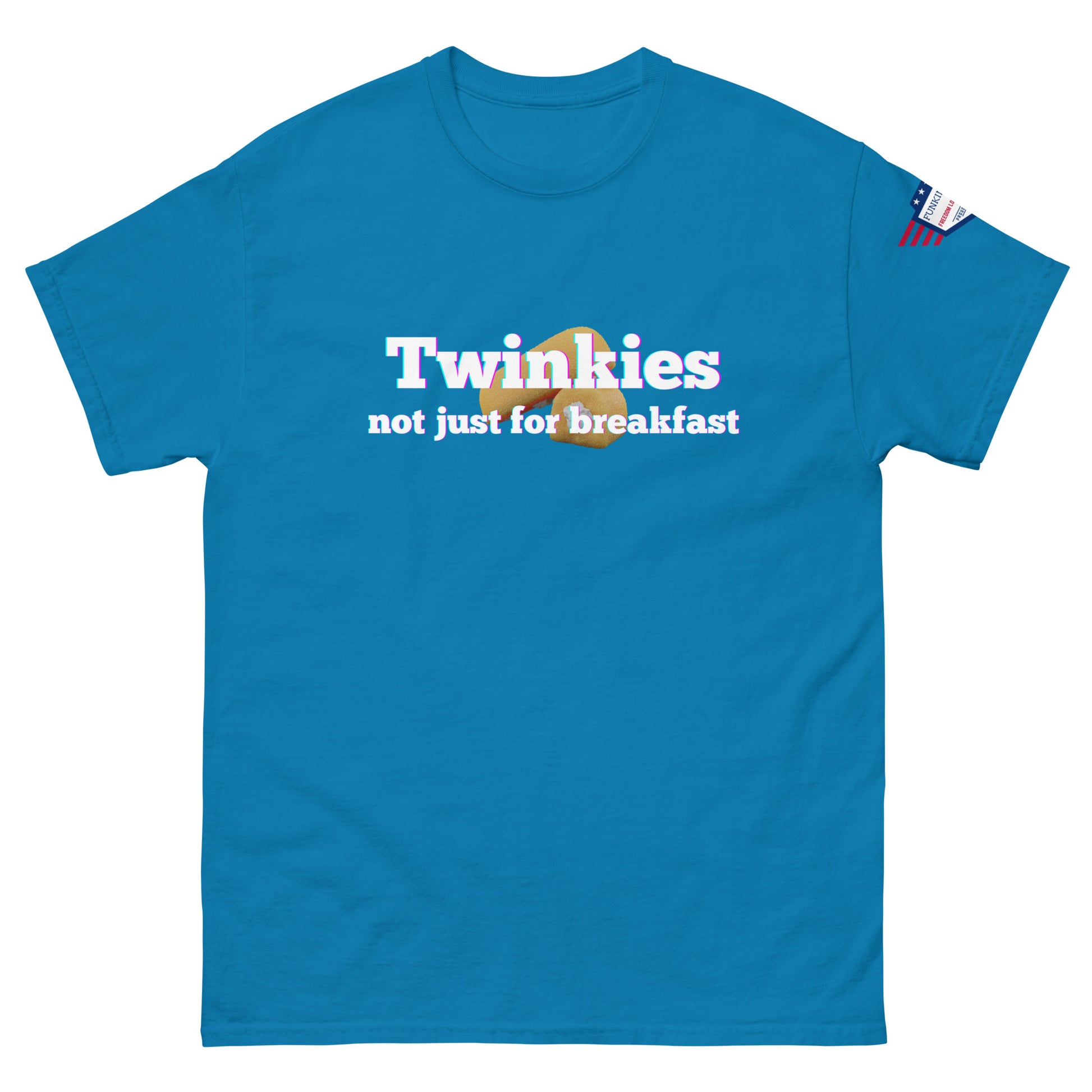 Front view of sky blue unisex tee with "Twinkiesies" multicolored text, Twinkie graphic, "not just for breakfast," sleeve flag