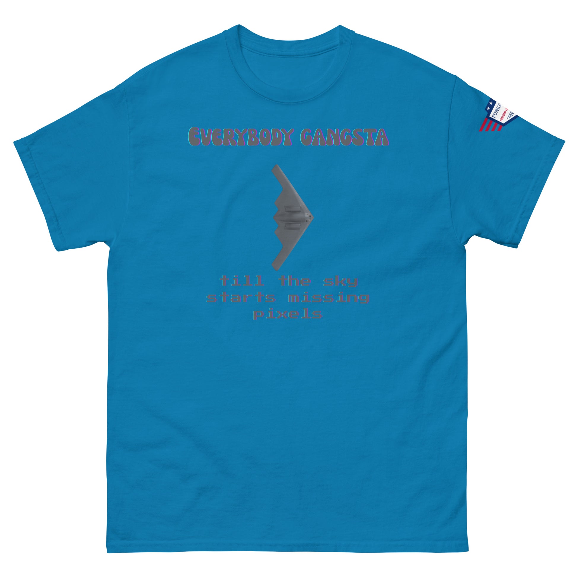 Front close-up of royal blue unisex tee with purple "EVERYBODY GANGSTA", stealth bomber, green "till the sky starts missing pixels"