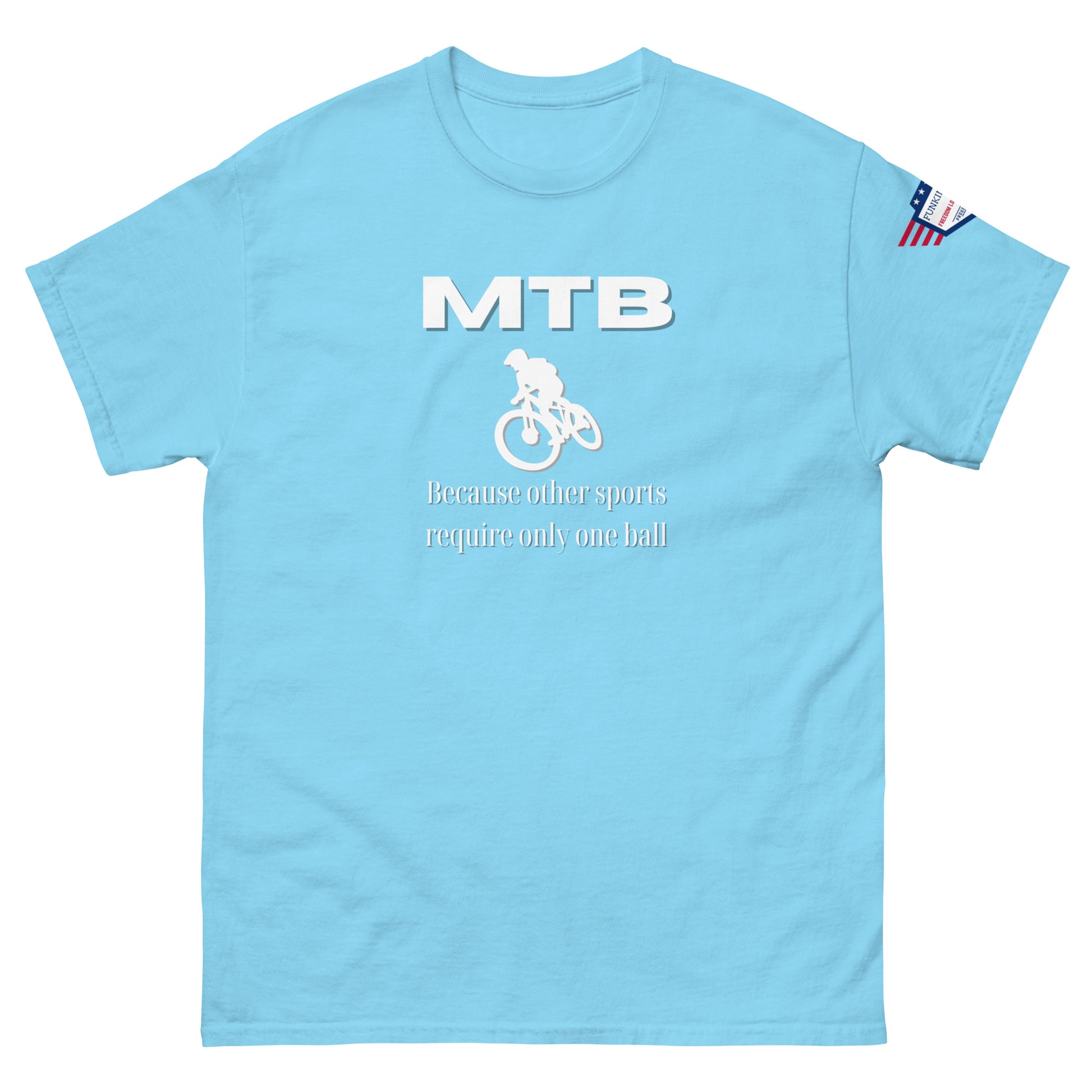 Front view of sky blue unisex tee with white "MTB" print, biker silhouette, "Because other sports require only one ball" text, and flag sleeve patch