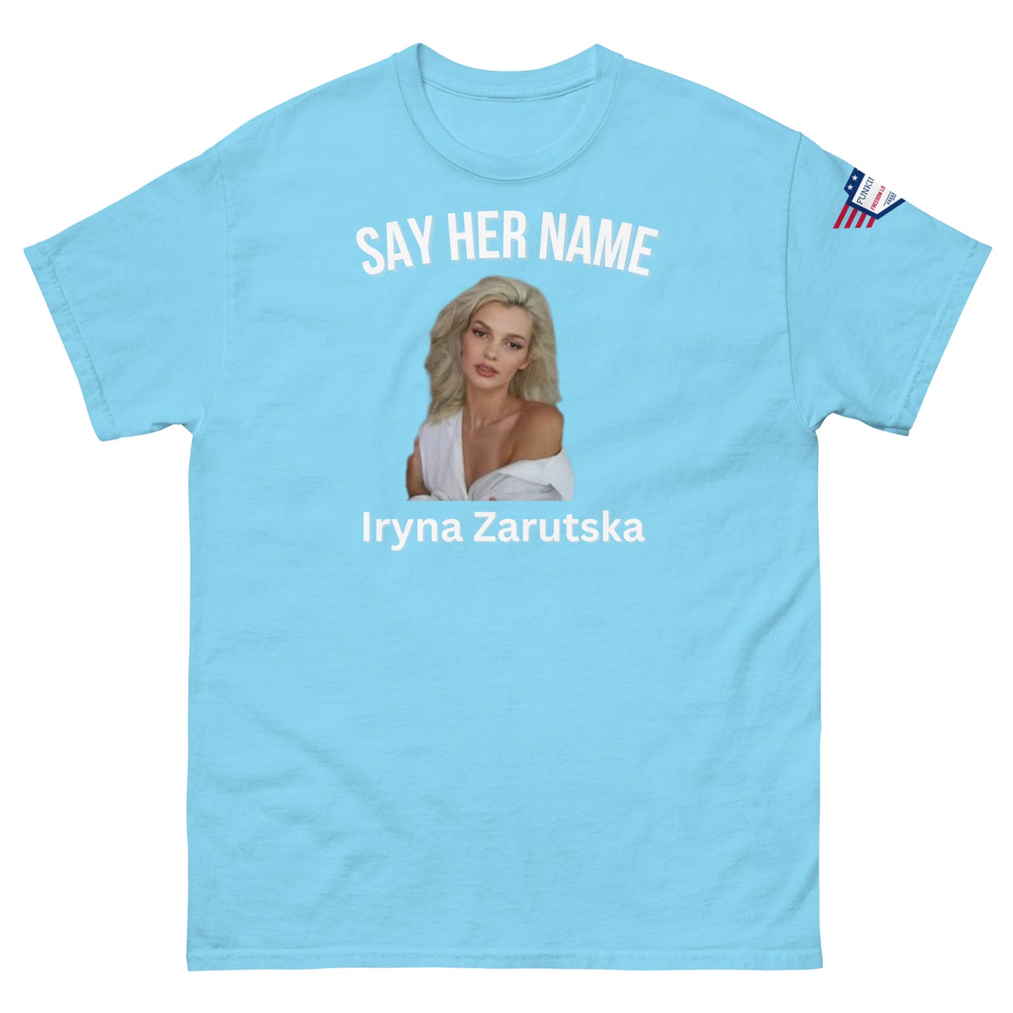 Front view of sky blue "SAY HER NAME Iryna Zarzutska" meme tee with USA flag sleeve patch