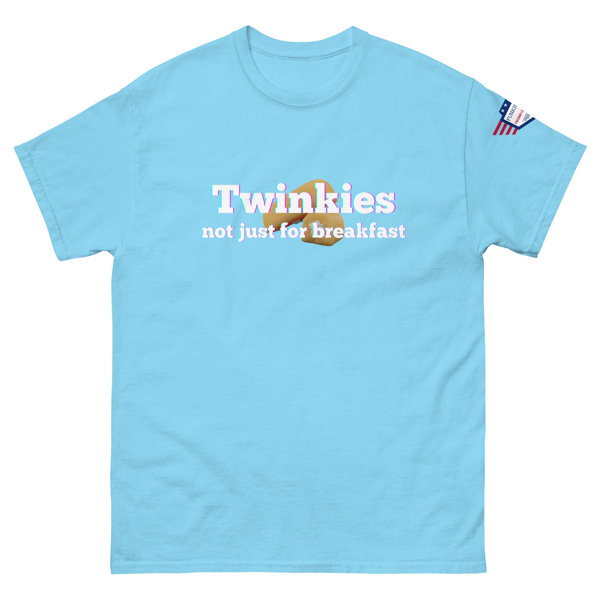 Front view of light cyan unisex tee with glowing "Twinkiesies" Twinkie print and "not just for breakfast" text, flag sleeve label