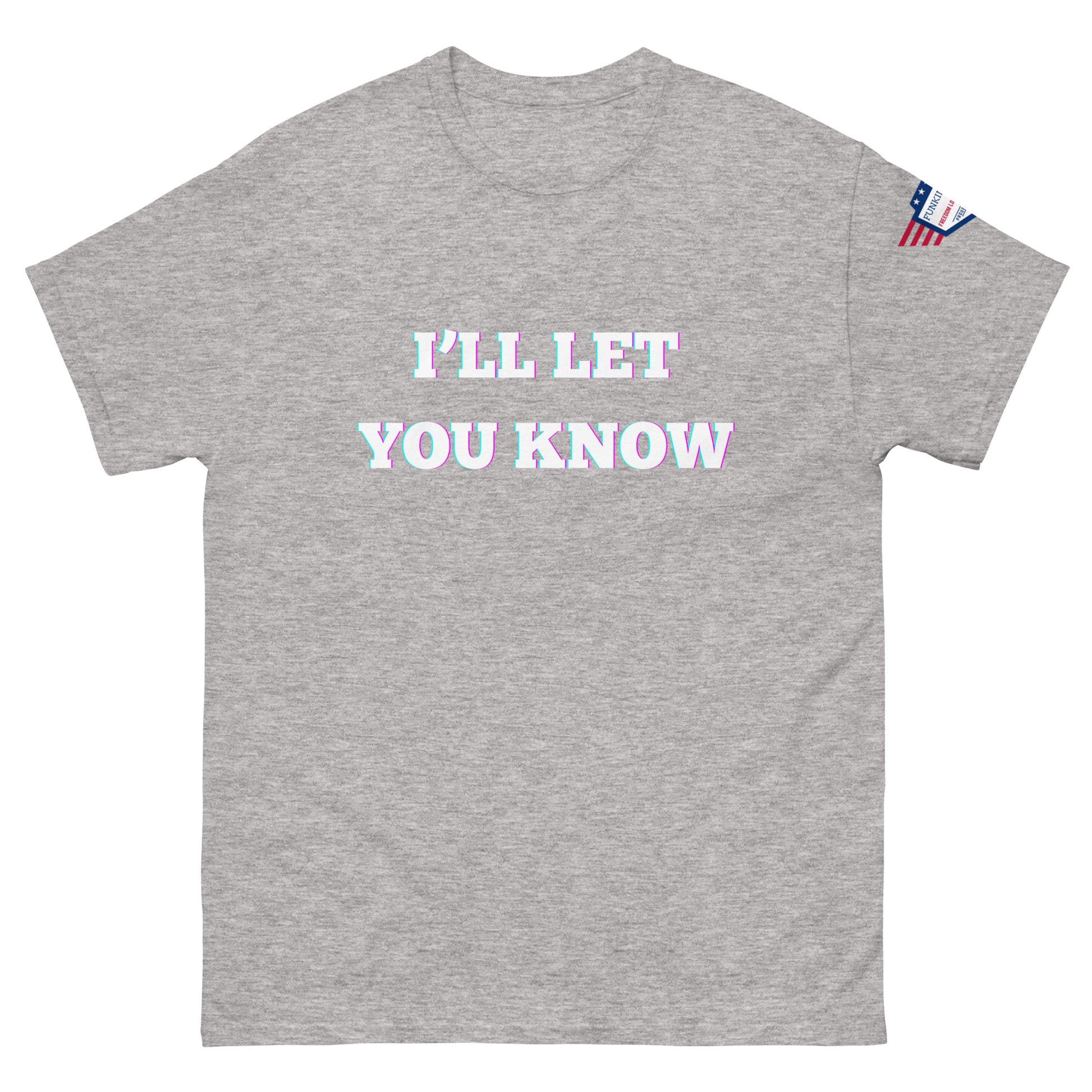 Front view of light heather gray unisex T-shirt featuring "I'LL LET YOU KNOW" in bold glowy white, USA flag on shoulder