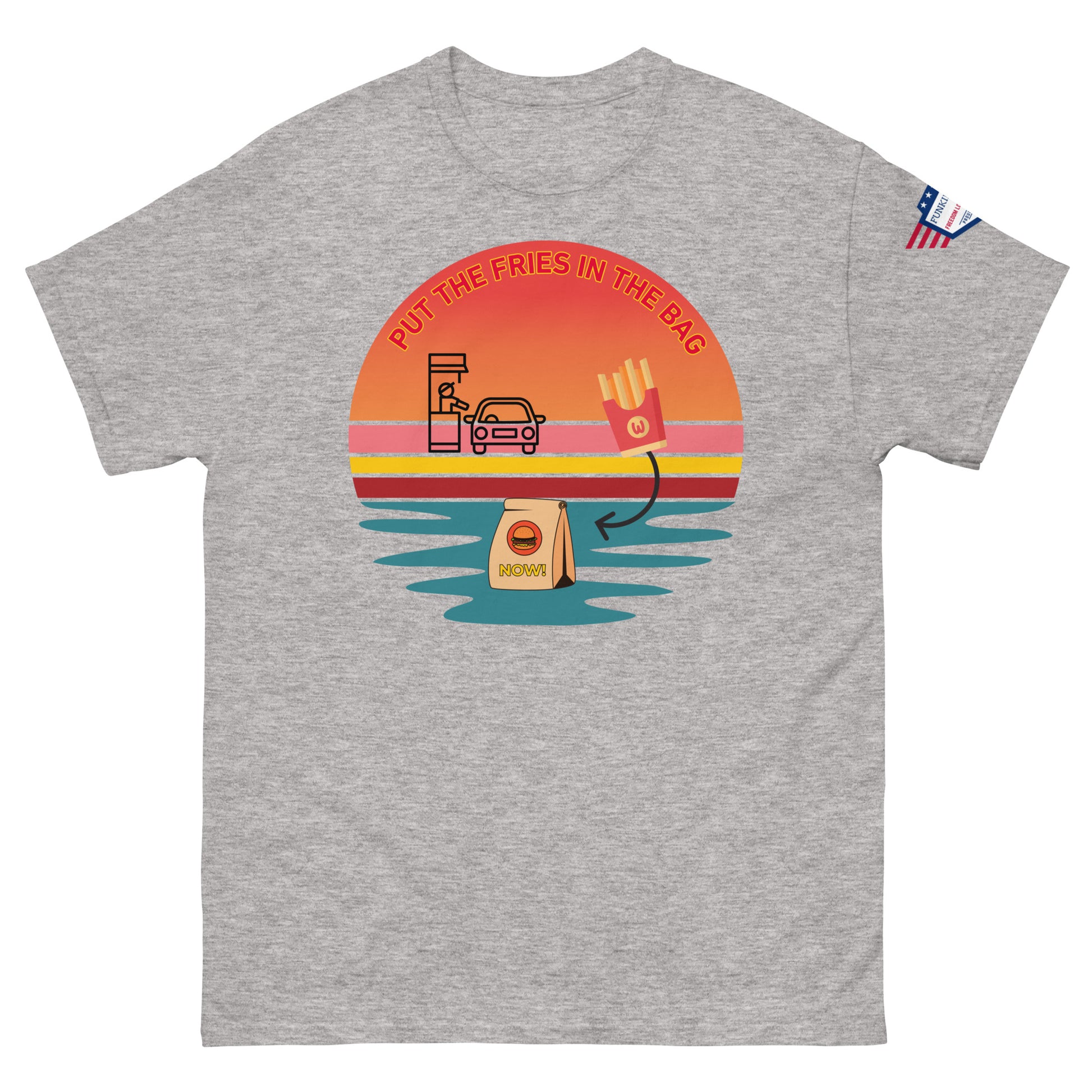 Front view of ash gray unisex t-shirt featuring "PUT THE FRIES IN THE BAG" funky drive-thru sunset graphic