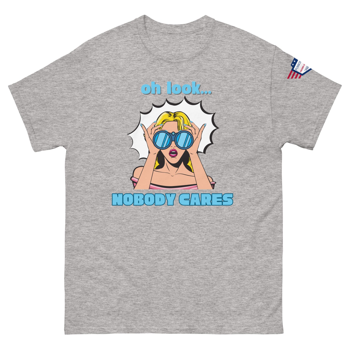 Front view of ash gray unisex t-shirt with "oh look... NOBODY CARES" sarcastic pop art print and USA flag sleeve patch