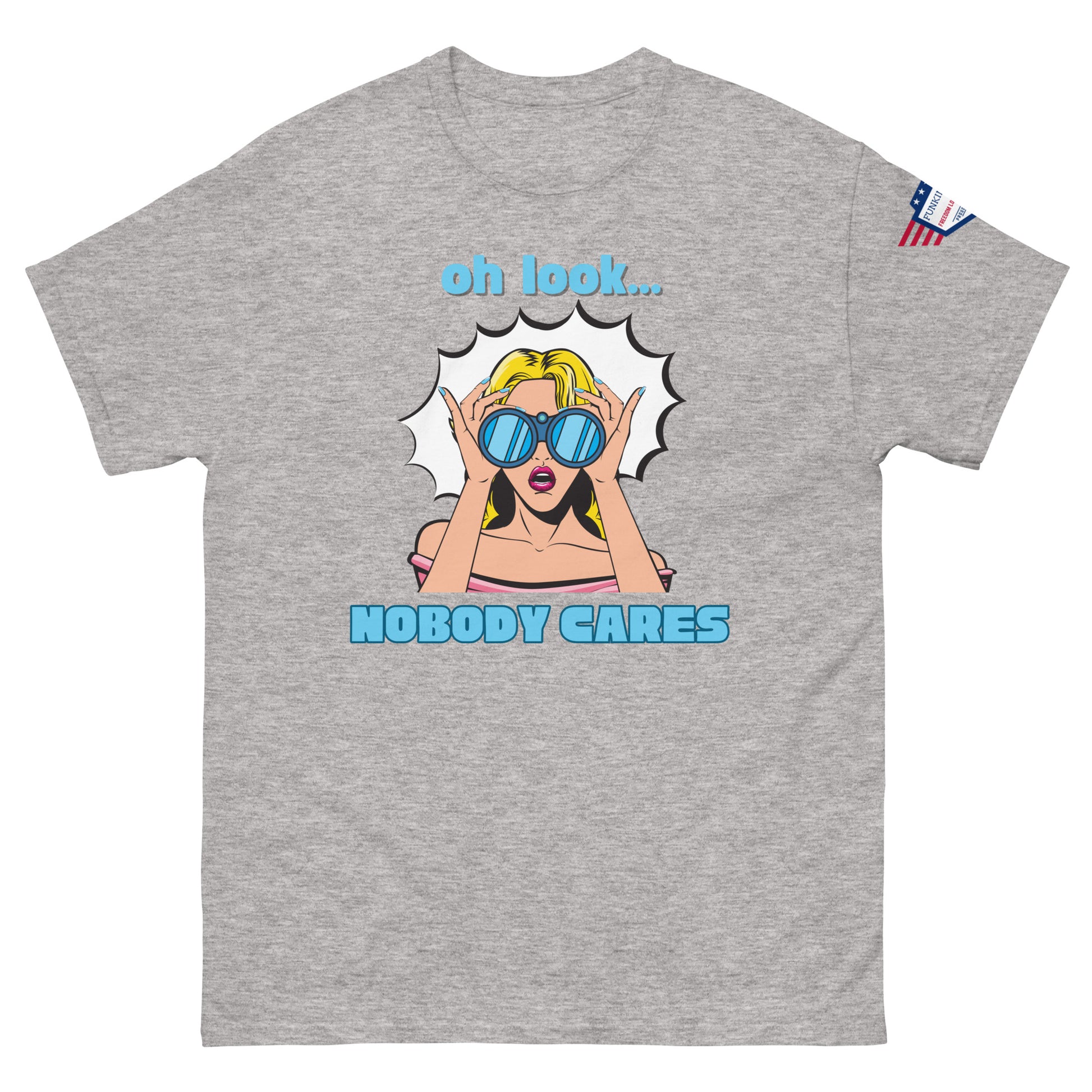 Front view of ash gray unisex t-shirt with "oh look... NOBODY CARES" sarcastic pop art print and USA flag sleeve patch