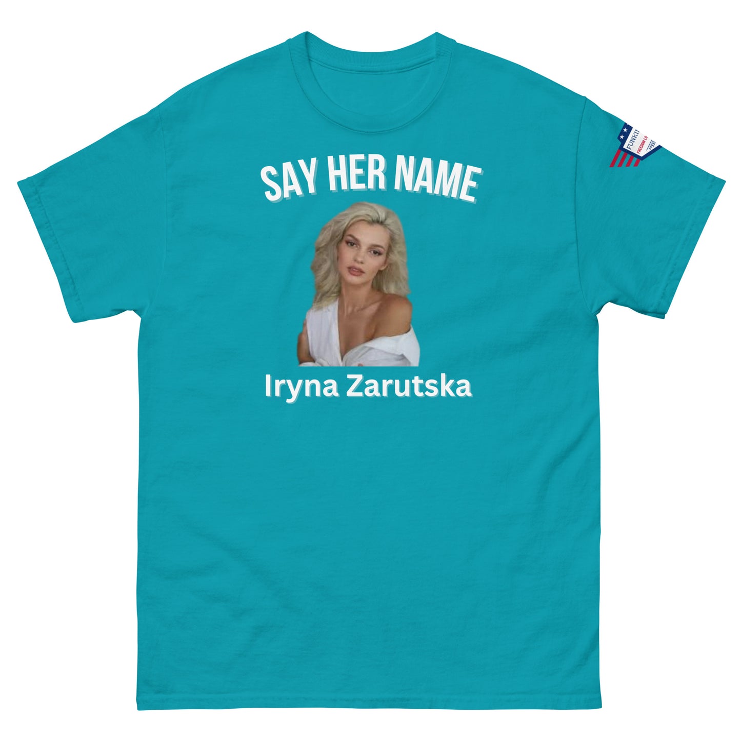Front view of cyan blue "SAY HER NAME Iryna Zarzutska" tee with white print, flag patch