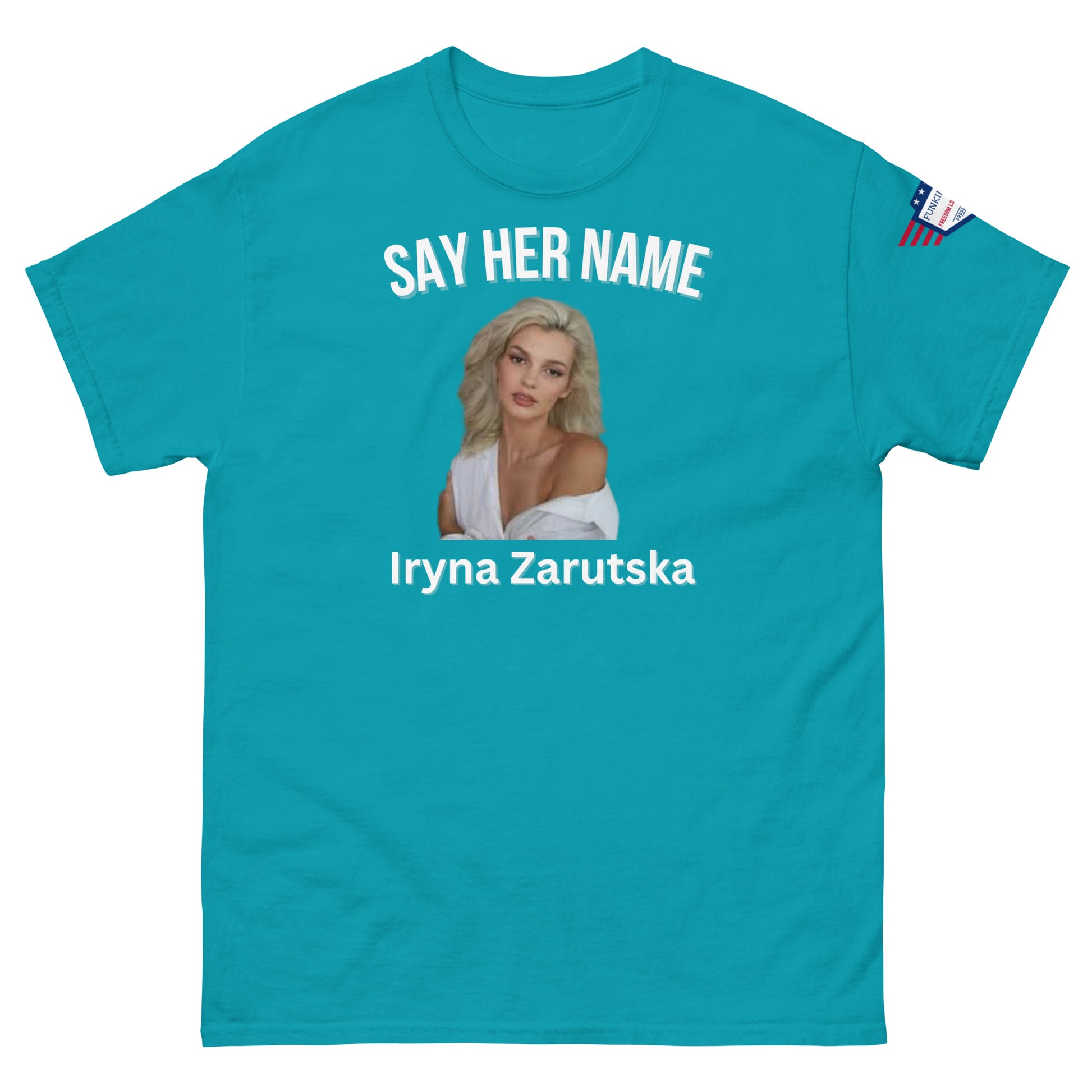 Front view of cyan blue "SAY HER NAME Iryna Zarzutska" tee with white print, flag patch