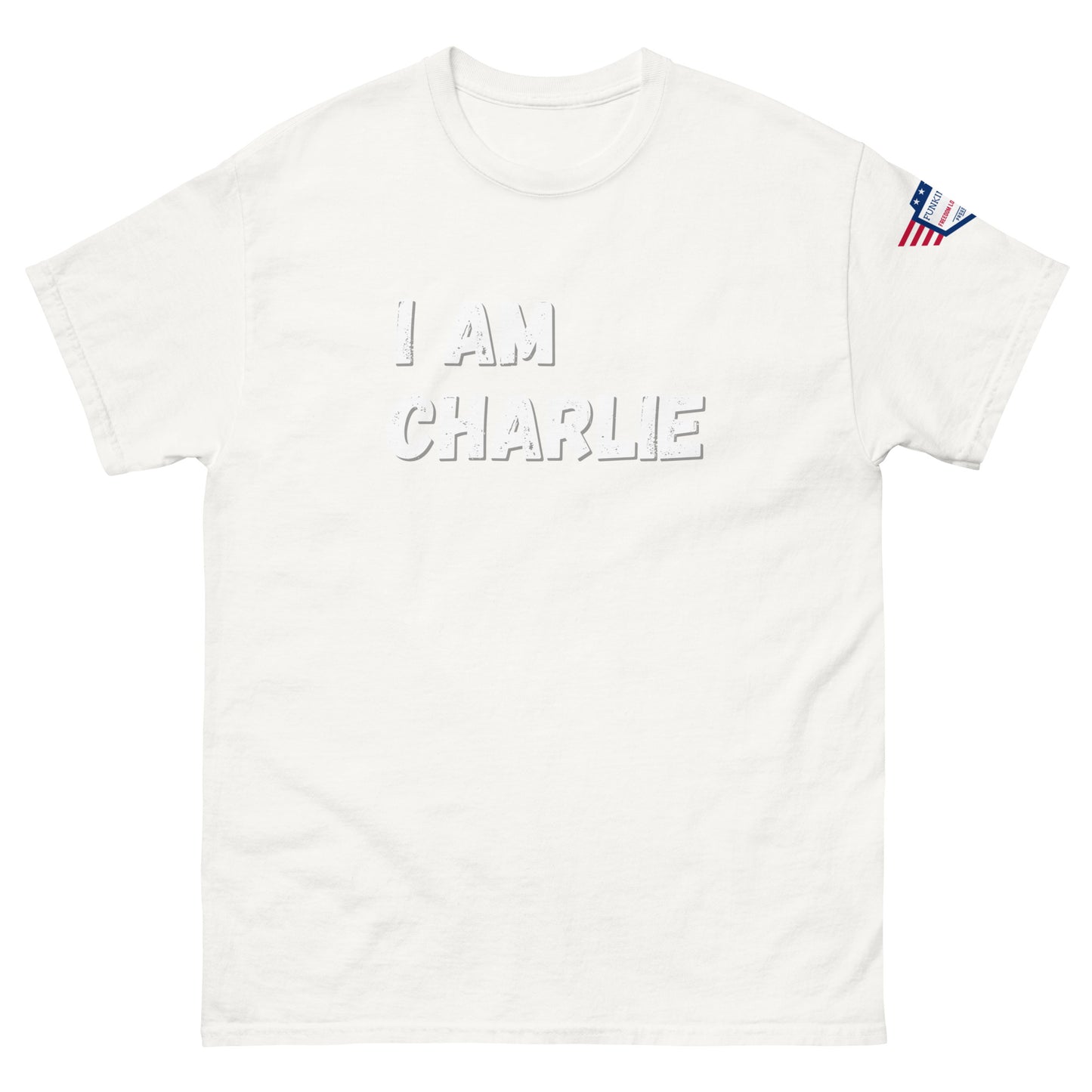 Front view of white unisex tee with bold white "I AM CHARLIE" graphic and small USA flag sleeve patch