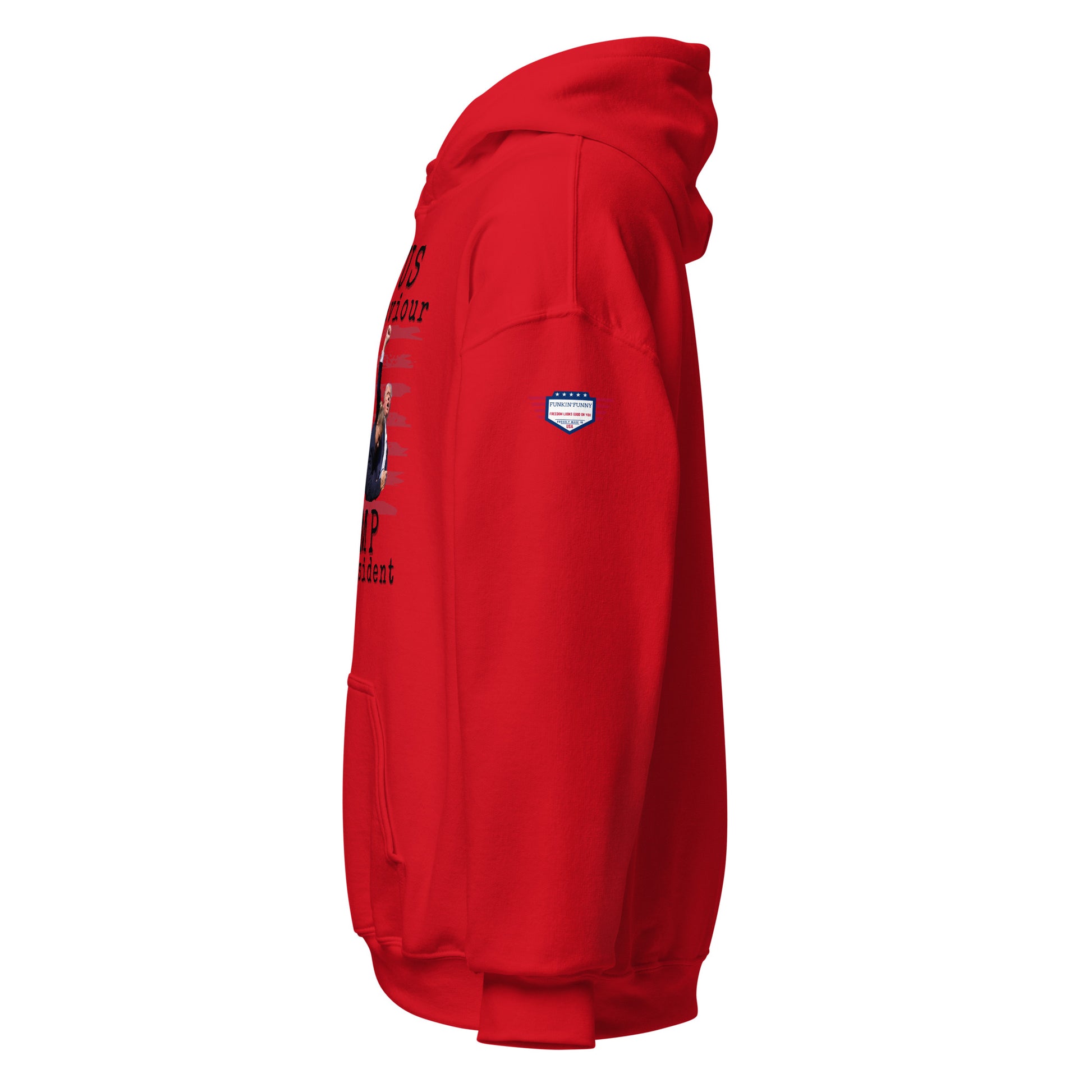 Side view of red unisex hoodie with partial white "Jesus is my saviour - Trump" text, edge of flag graphic, sleeve patch