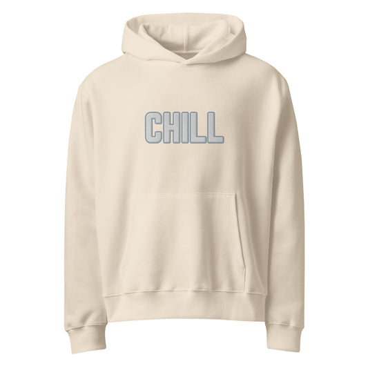 Front view of cream oversized hoodie with bold gray "CHILL" embroidery and kangaroo pocket