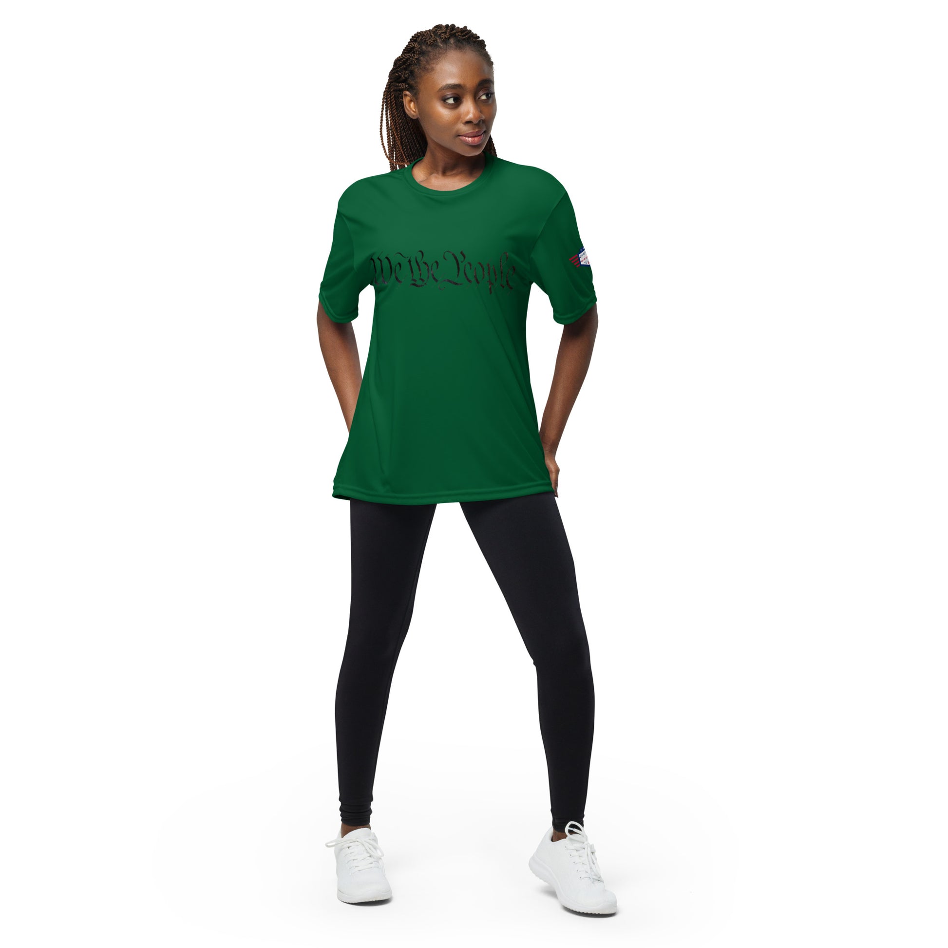 Woman in forest green "We The People" arched print performance tee front, flag sleeve