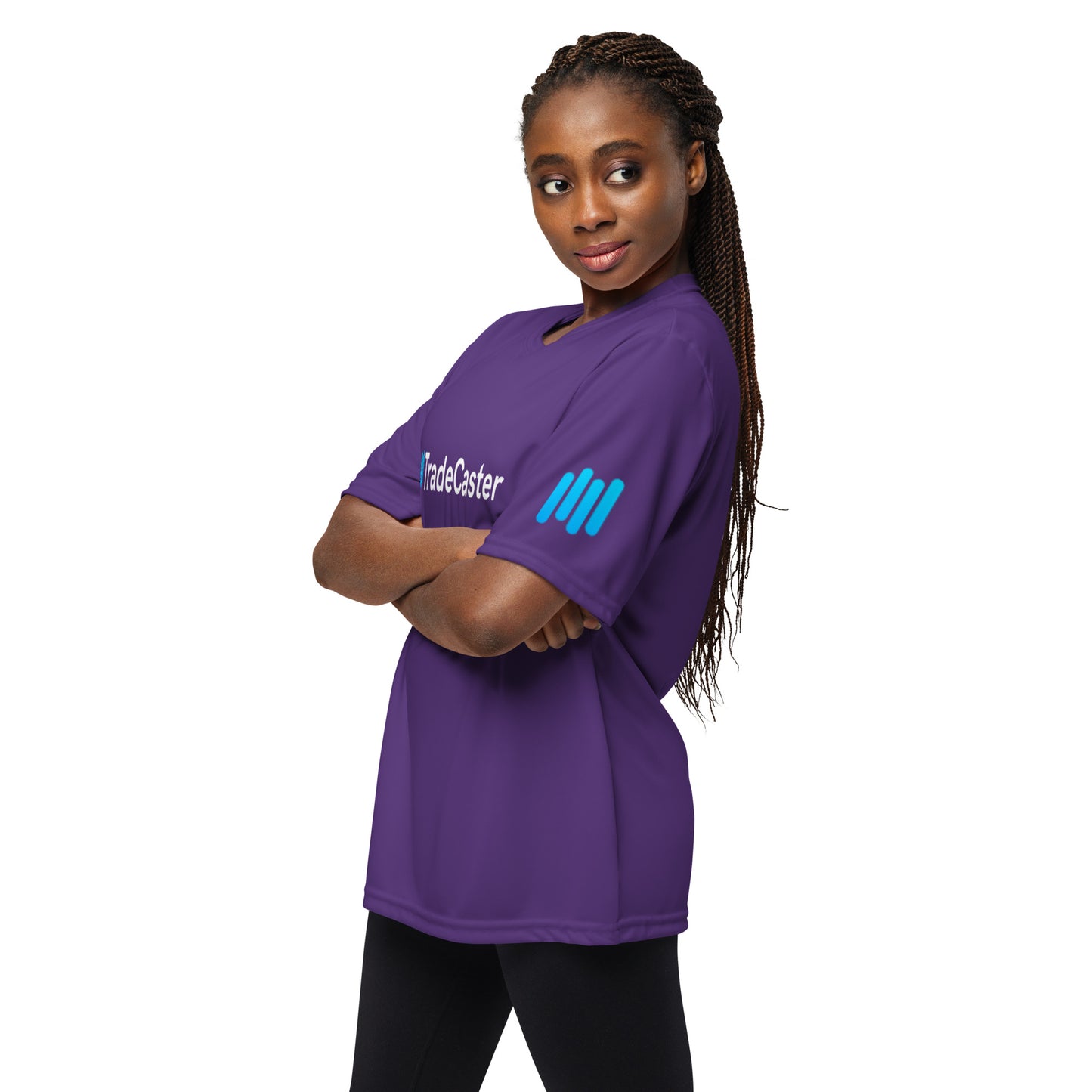 Braided model side-posing in purple performance tee, cyan #TradeCaster print and sleeve waves peeking through