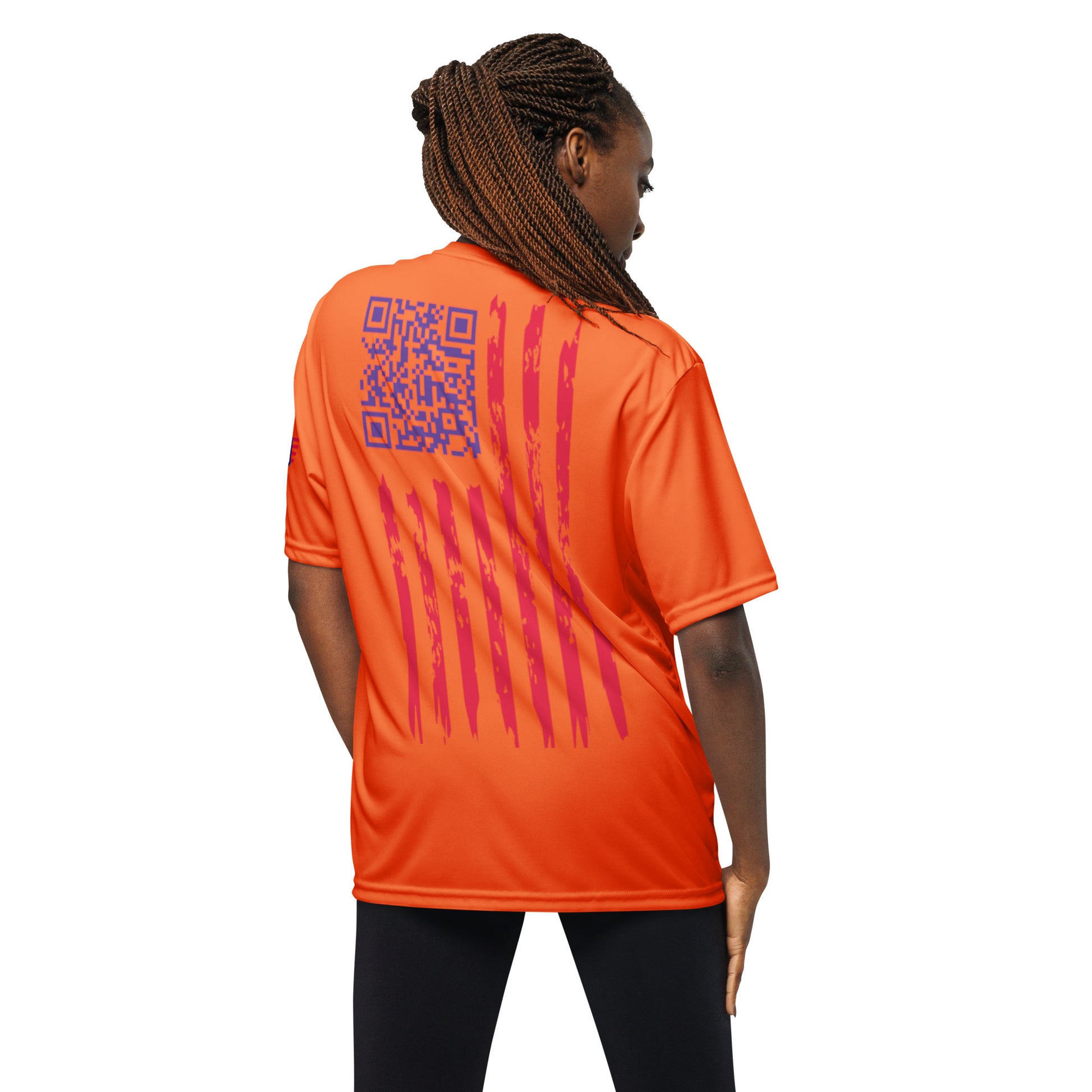 Back view orange performance shirt on woman, QR easter egg blending into flag stripes
