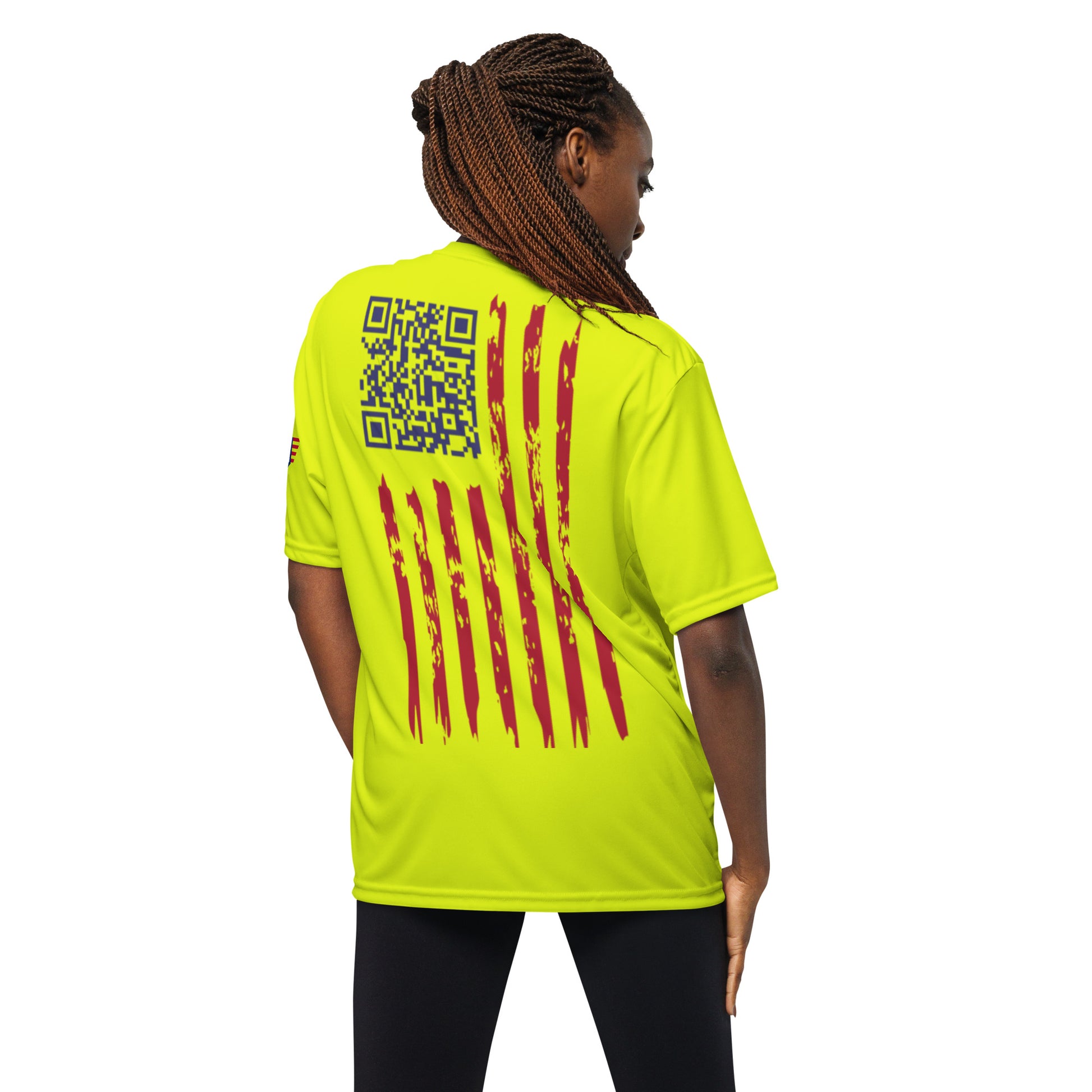 Back view of woman in bright lime performance tee showing blue QR code and red flag stripe surprise