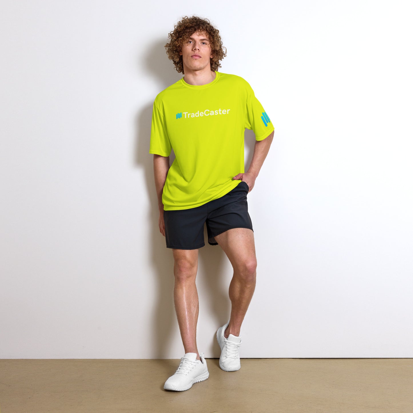 Side profile braided model rocking lime green performance tee, cyan sleeve patch flex