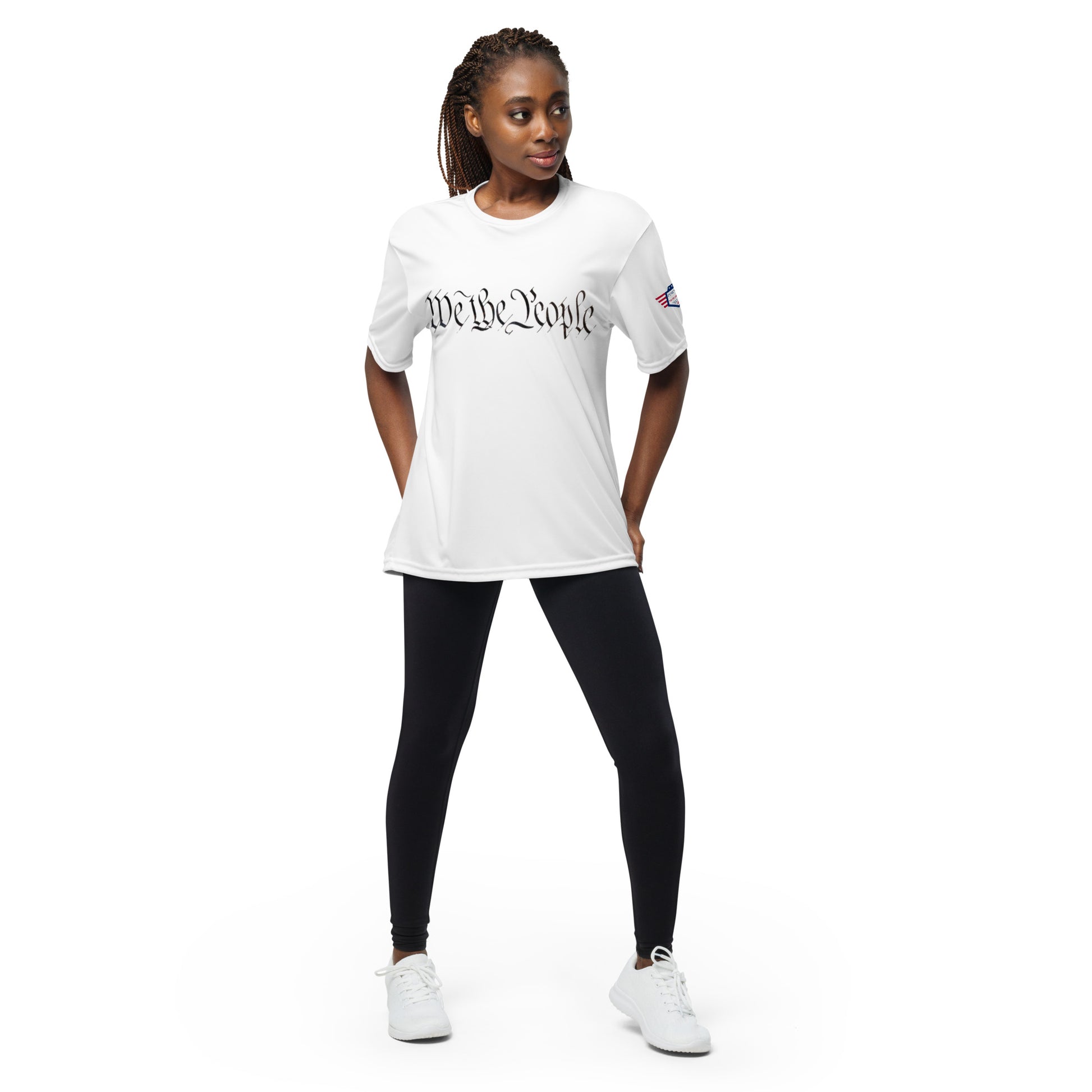 Woman posing in white "We The People" unisex performance tee, classic front print