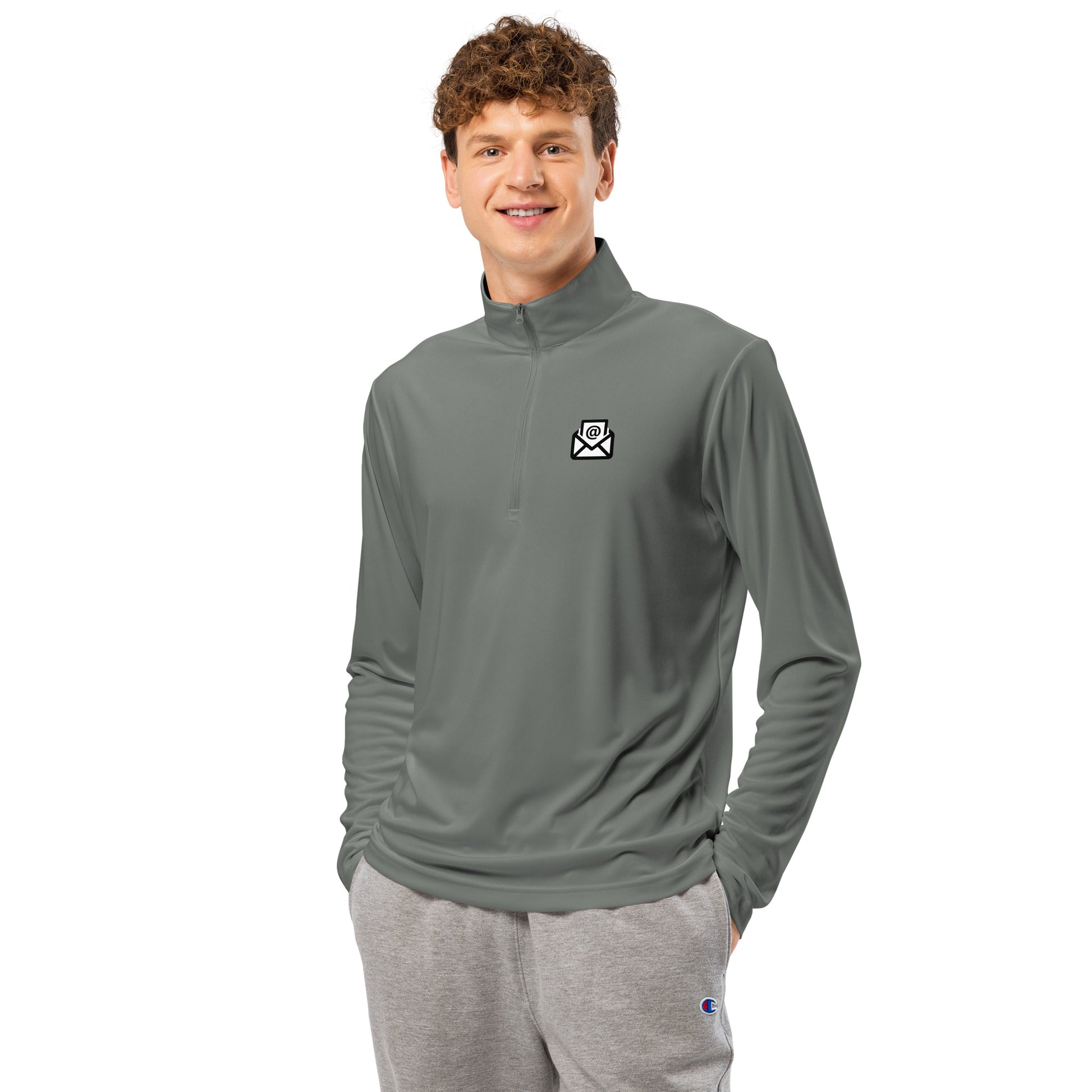 Model wearing light grey quarter-zip front with crisp white envelope emblem