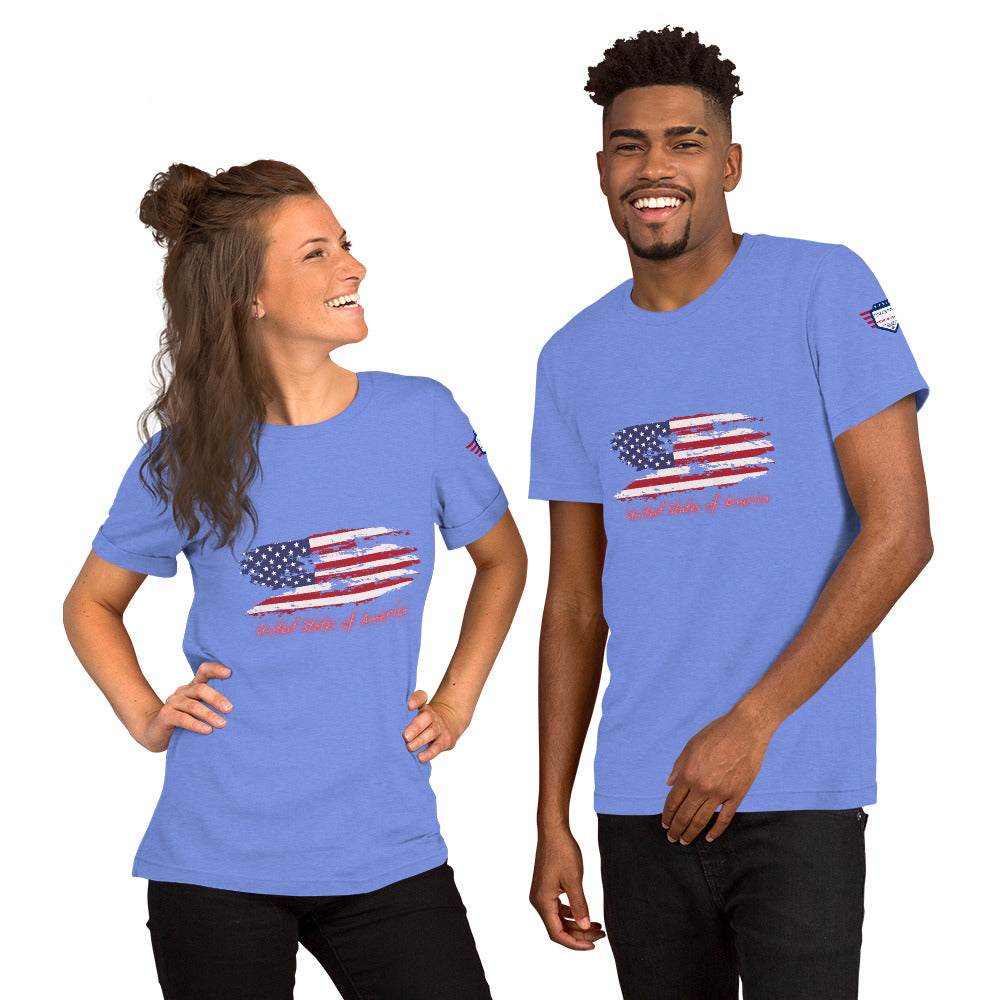 Cheerful couple wearing light blue tees with weathered USA flag graphic and red cursive "United States of America"