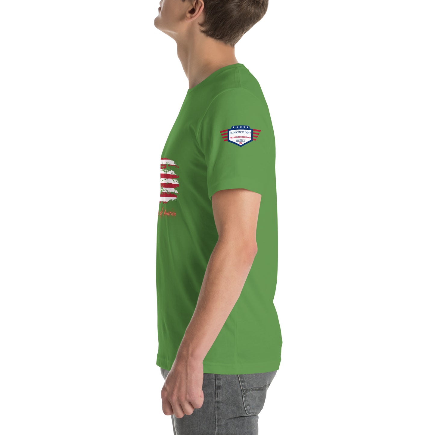 Side profile of model in green tee highlighting sleeve flag patch, looking up casually