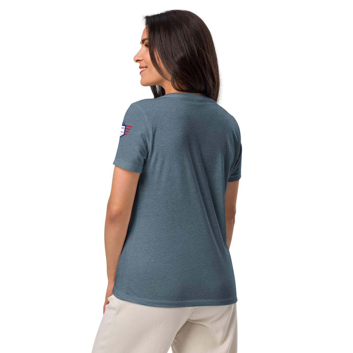 Side-back view of plain heather slate v-neck t-shirt on model — sideline chic, no text in sight