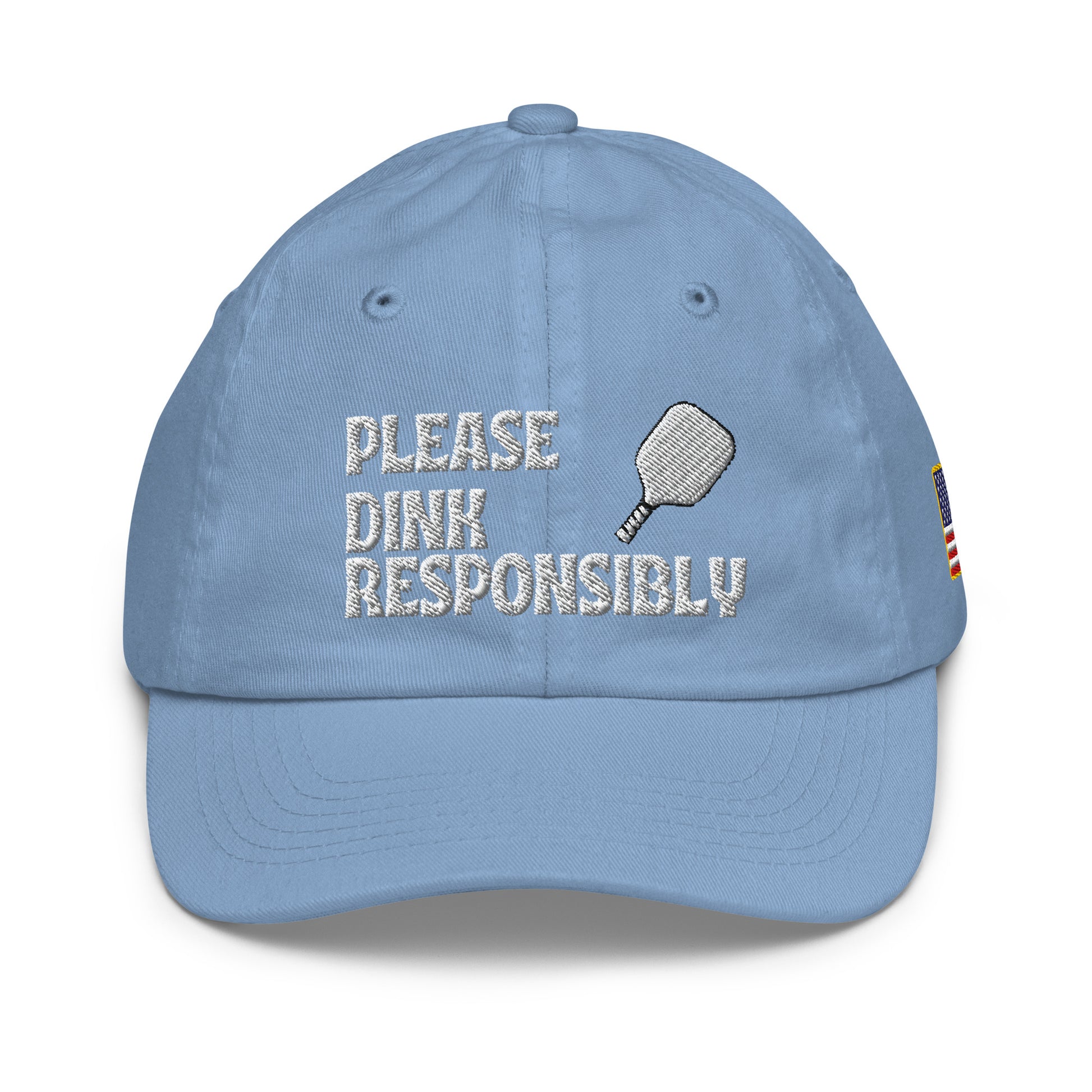 Front view of baby blue youth cap embroidered "Please Dink Responsibly" with pickleball paddle and flag