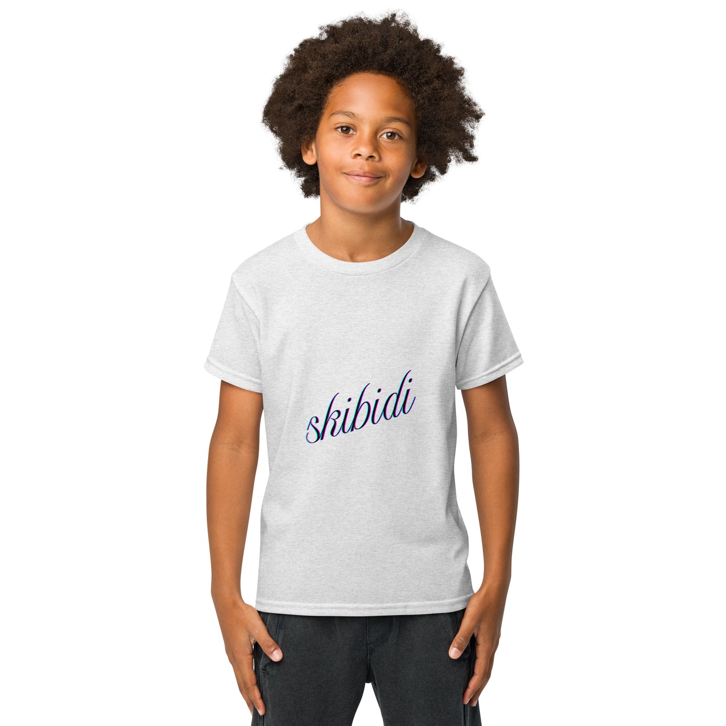 Front view of navy cursive "skibidi" on off-white youth t-shirt, smiling kid with hands in pockets