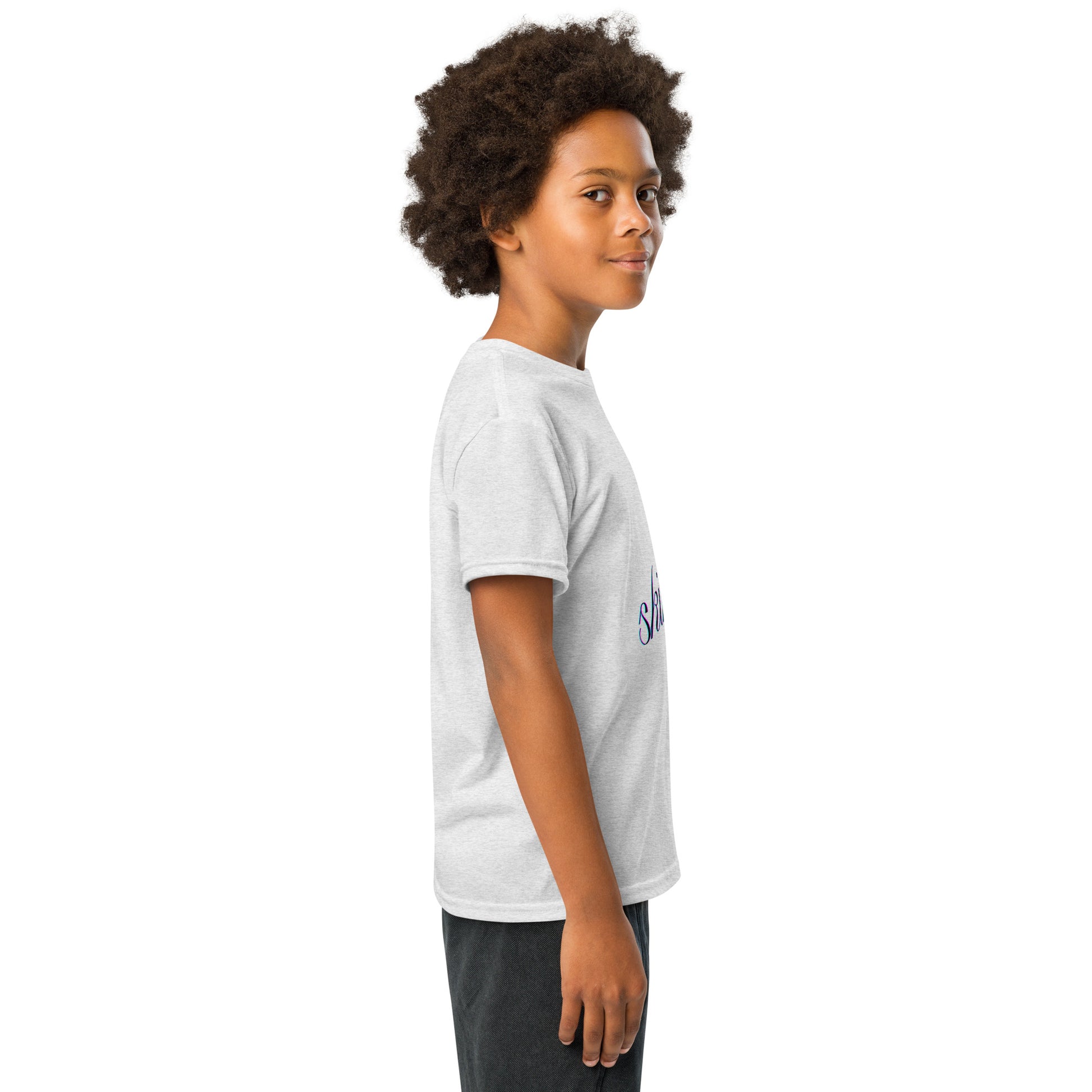 3/4 right view partial navy "skibidi" cursive on off-white youth t-shirt, kid grinning