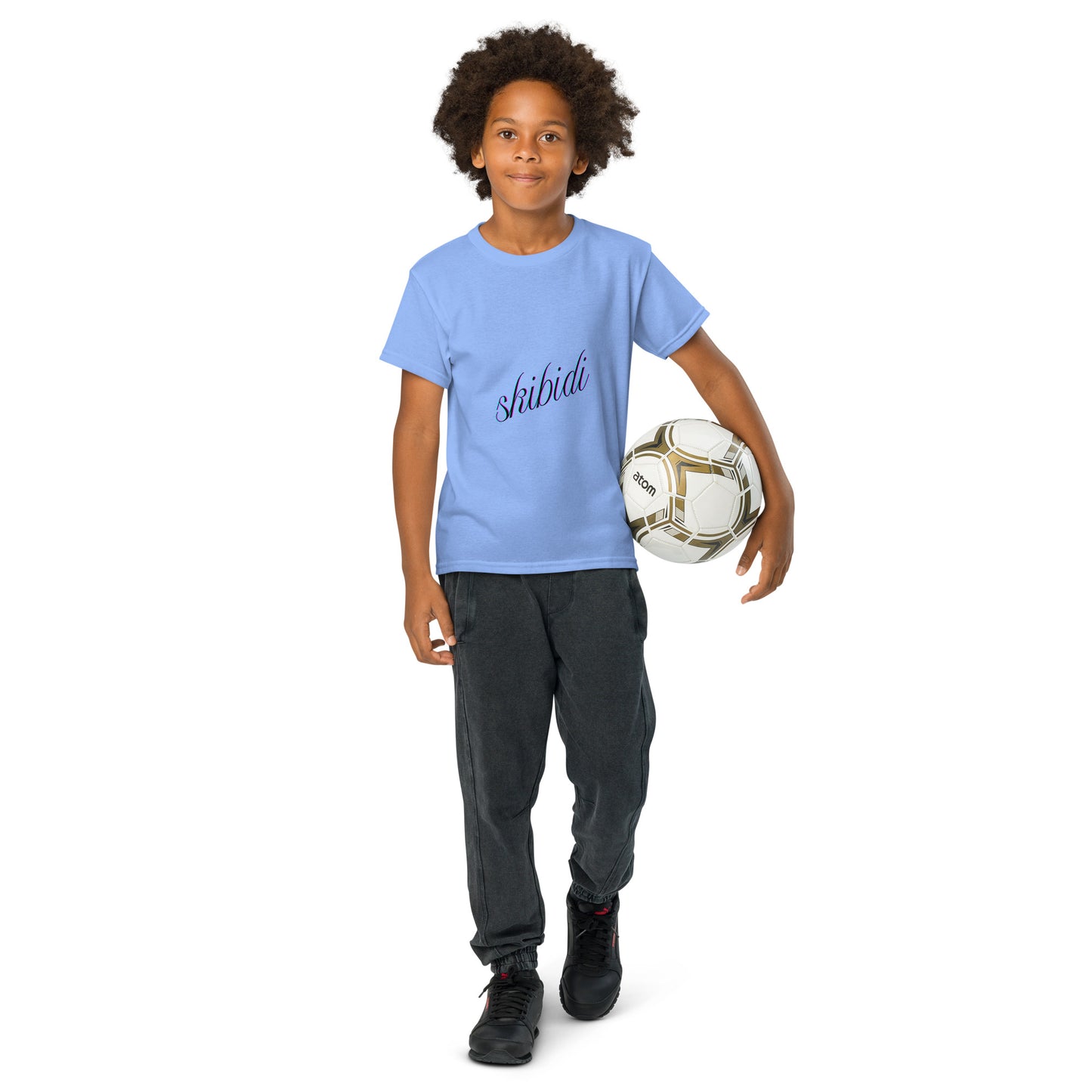 Smiling kid front view in gold skibidi youth t-shirt, navy cursive "skibidi" on chest
