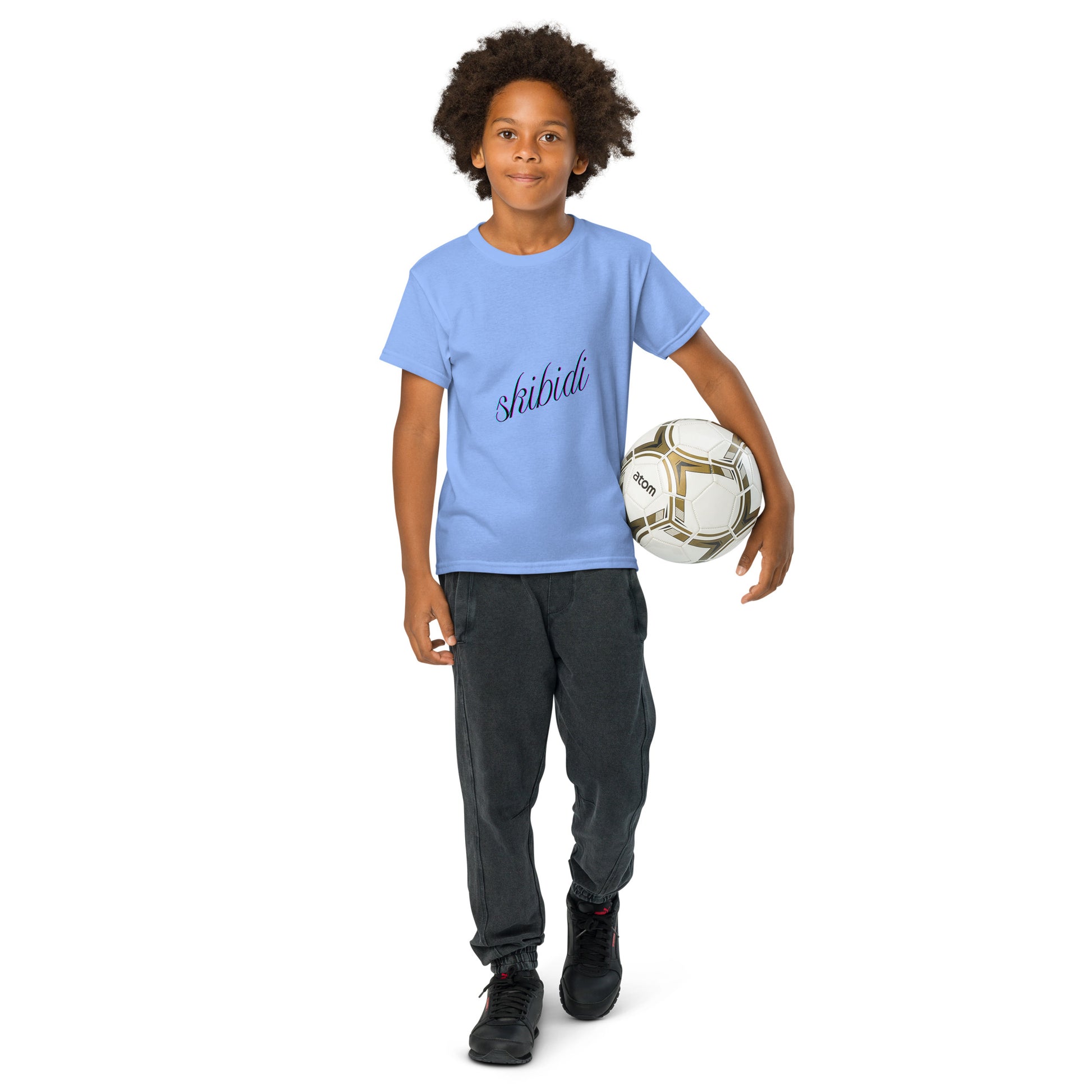 Smiling kid front view in gold skibidi youth t-shirt, navy cursive "skibidi" on chest
