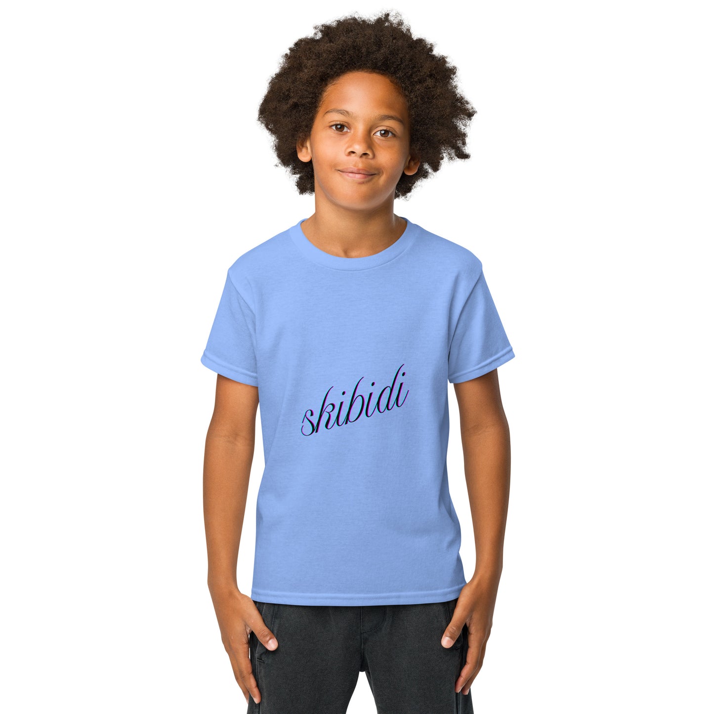 Kid model front view in Carolina blue skibidi youth t-shirt, navy cursive "skibidi" print, hands in pockets