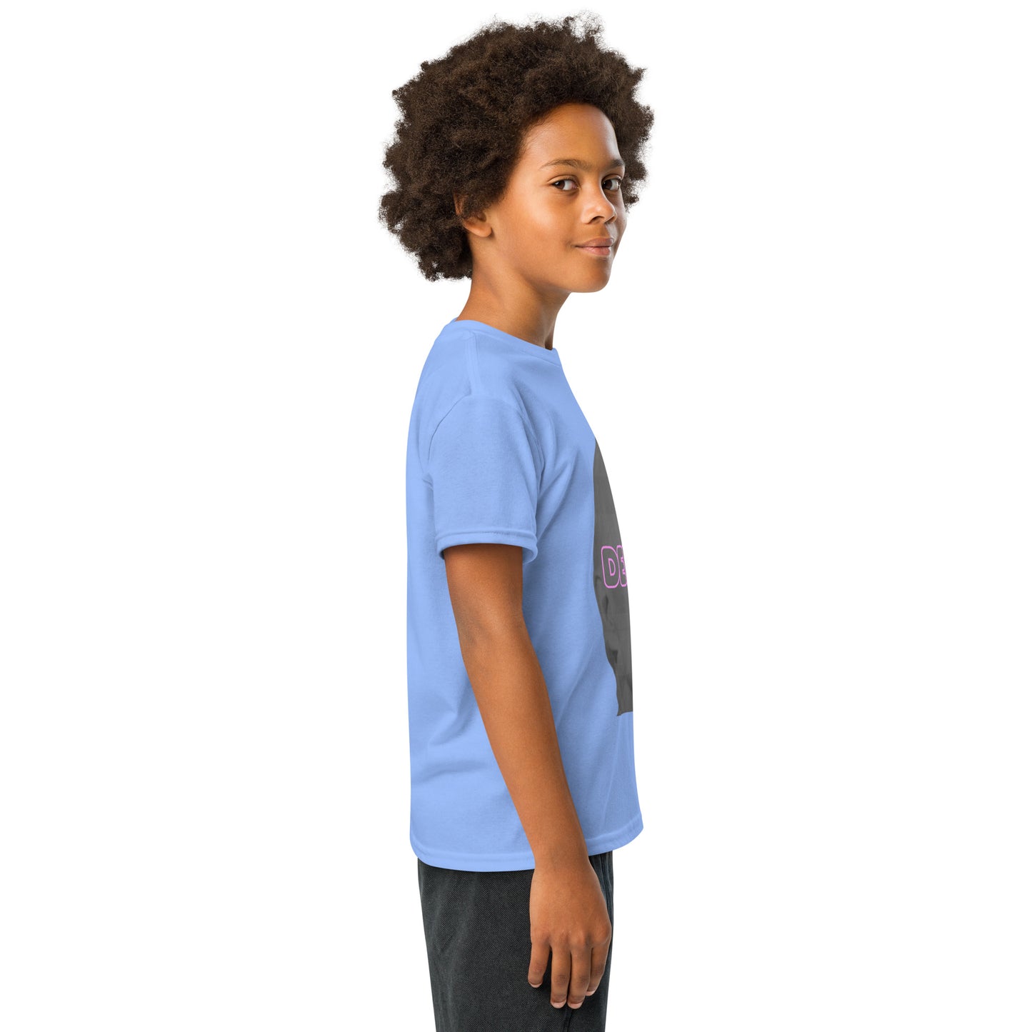 Right side view of kid in Carolina blue Delulu youth t-shirt, edge of gray face and pink "DELU" visible