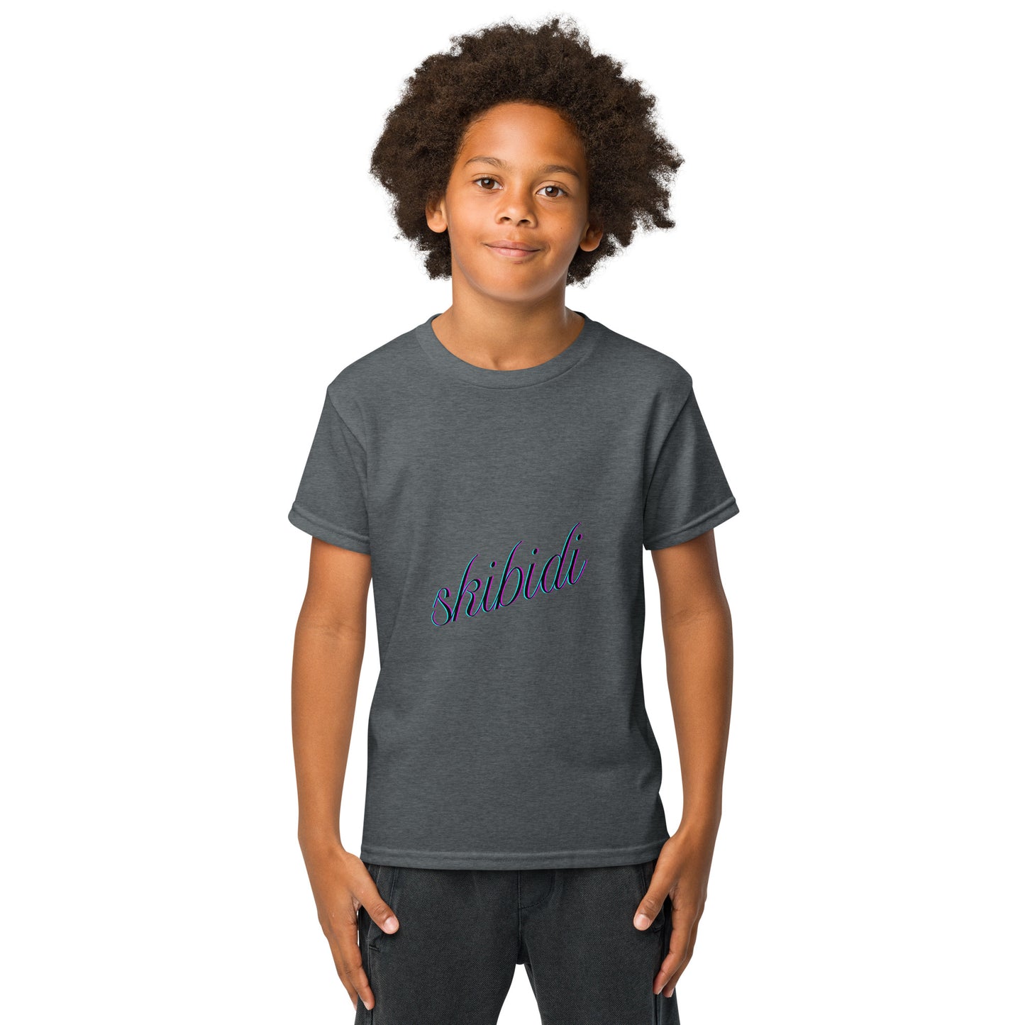 Front view of young model in dark heather gray youth t-shirt with purple cursive "skibidi" on chest, hands in pockets