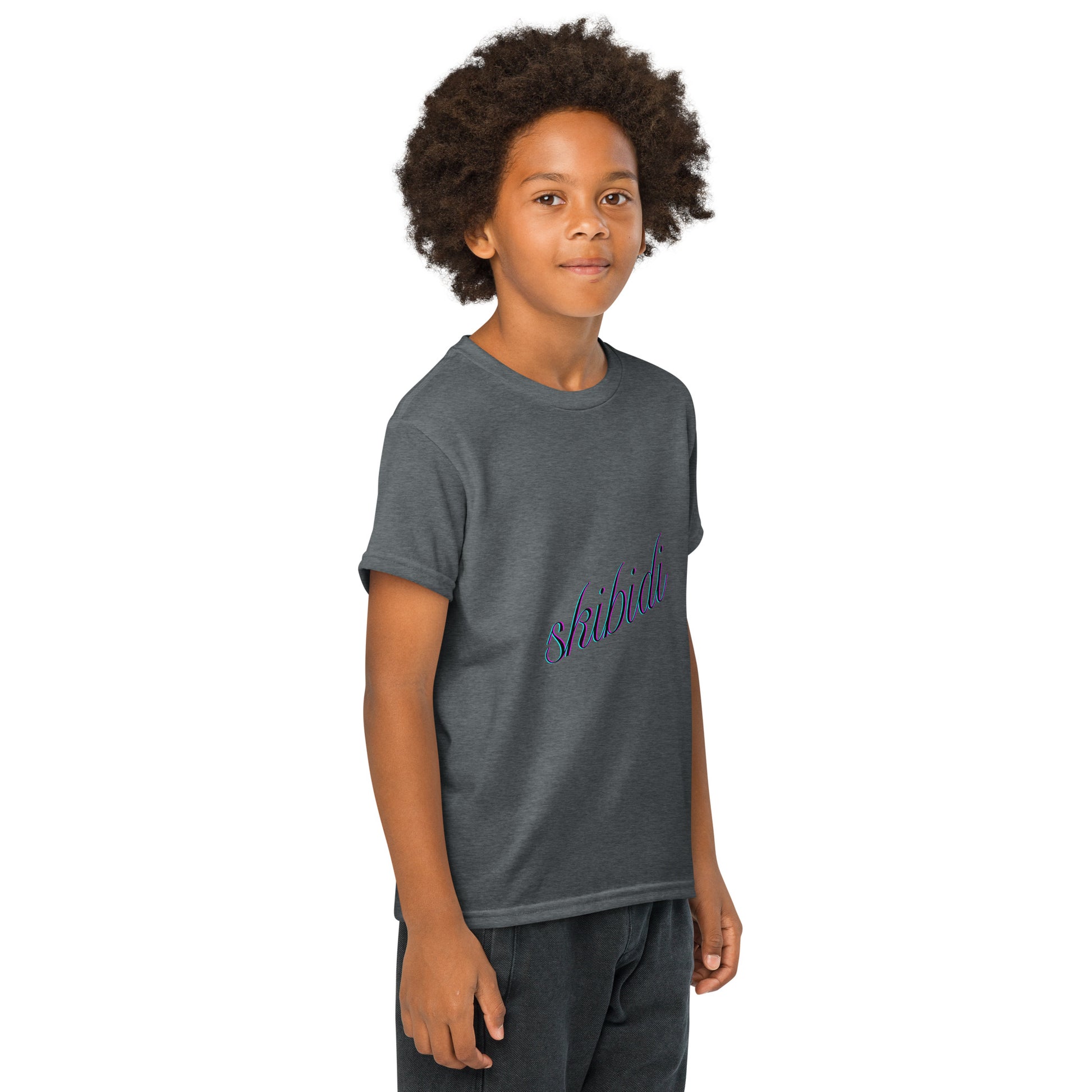 Side view of young model in dark heather gray youth t-shirt showing purple cursive "skibidi"