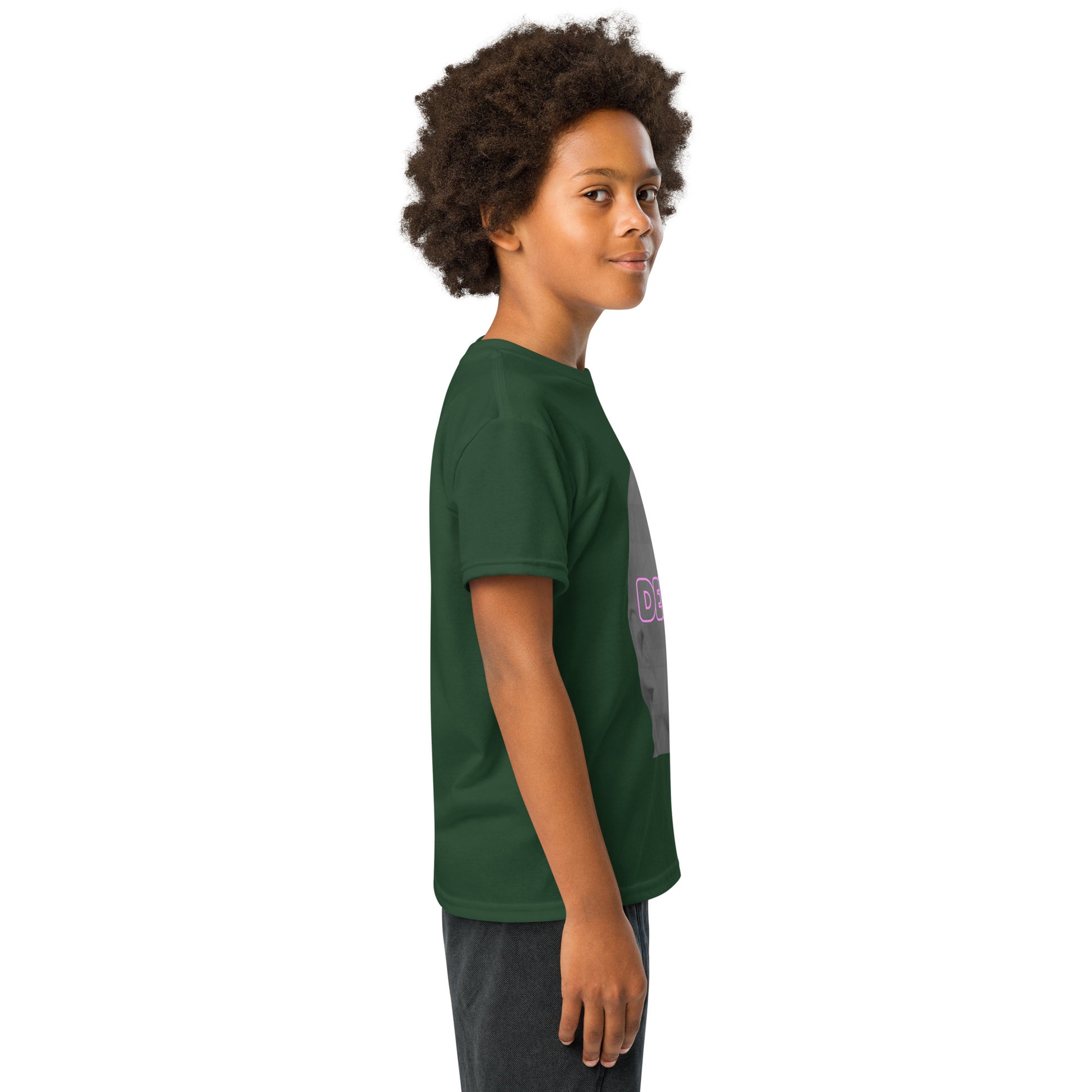 Angled side view of boy wearing forest green Delulu youth t-shirt showing pink "DELU" on gray face