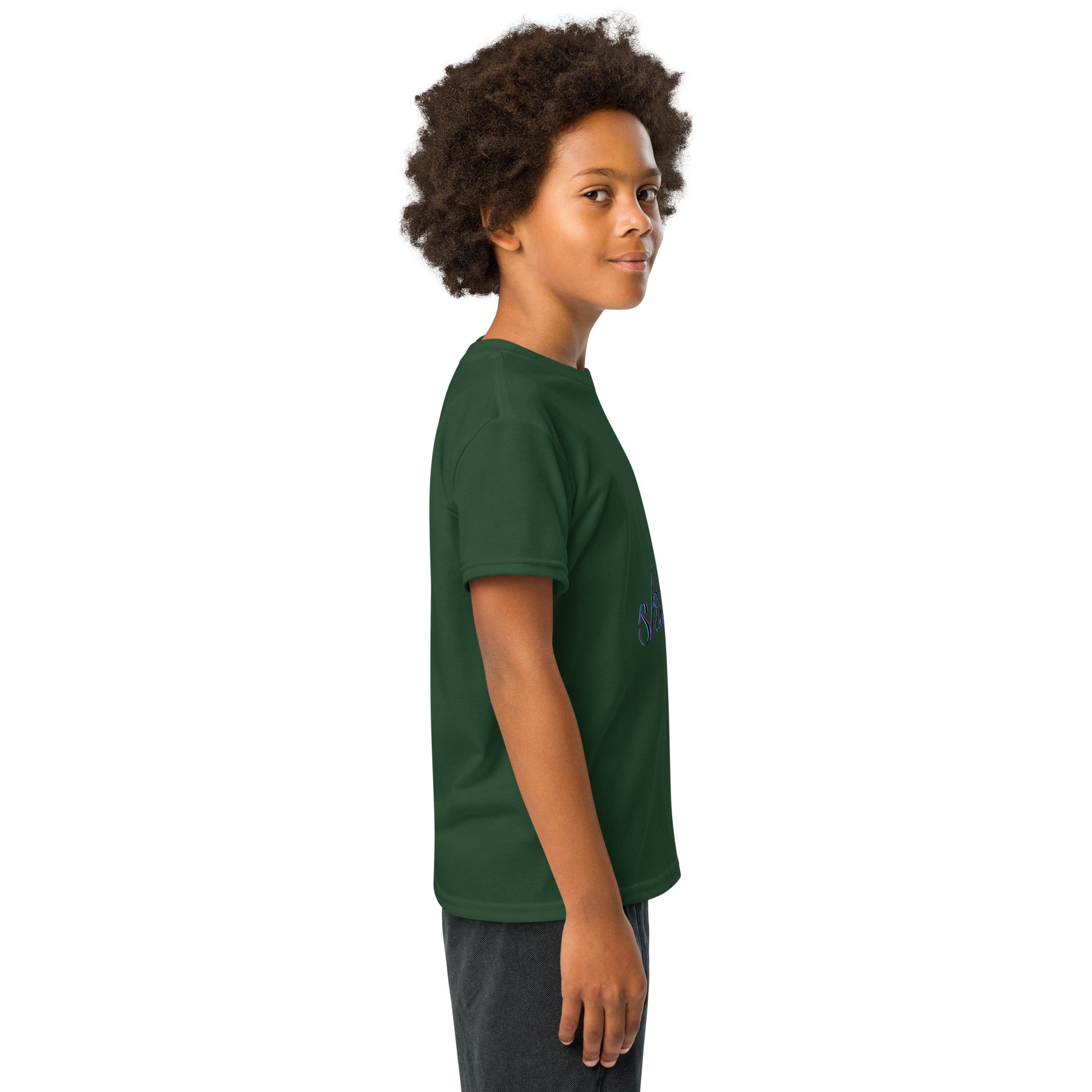 Right side view of young model in forest green youth t-shirt, hint of purple "skibidi"