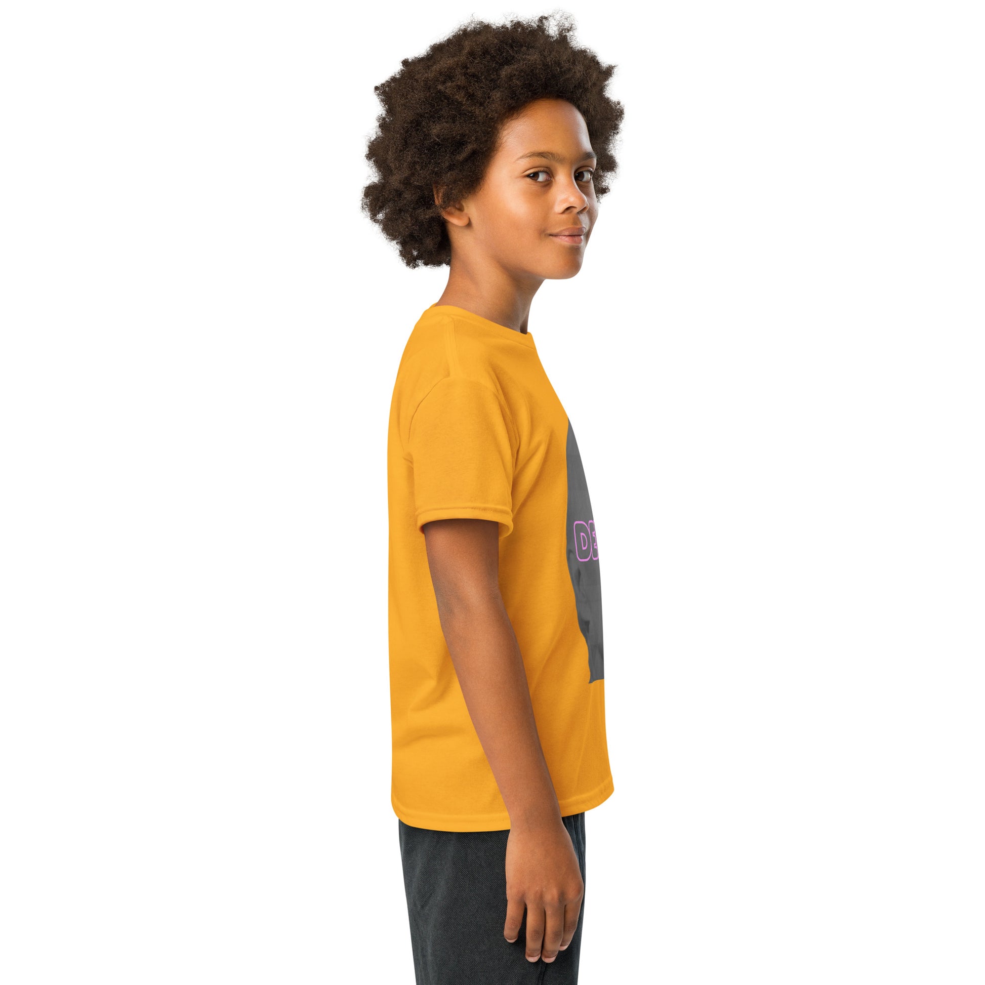 Right side view of gold Delulu tee on kid, partial pink print on gray silhouette