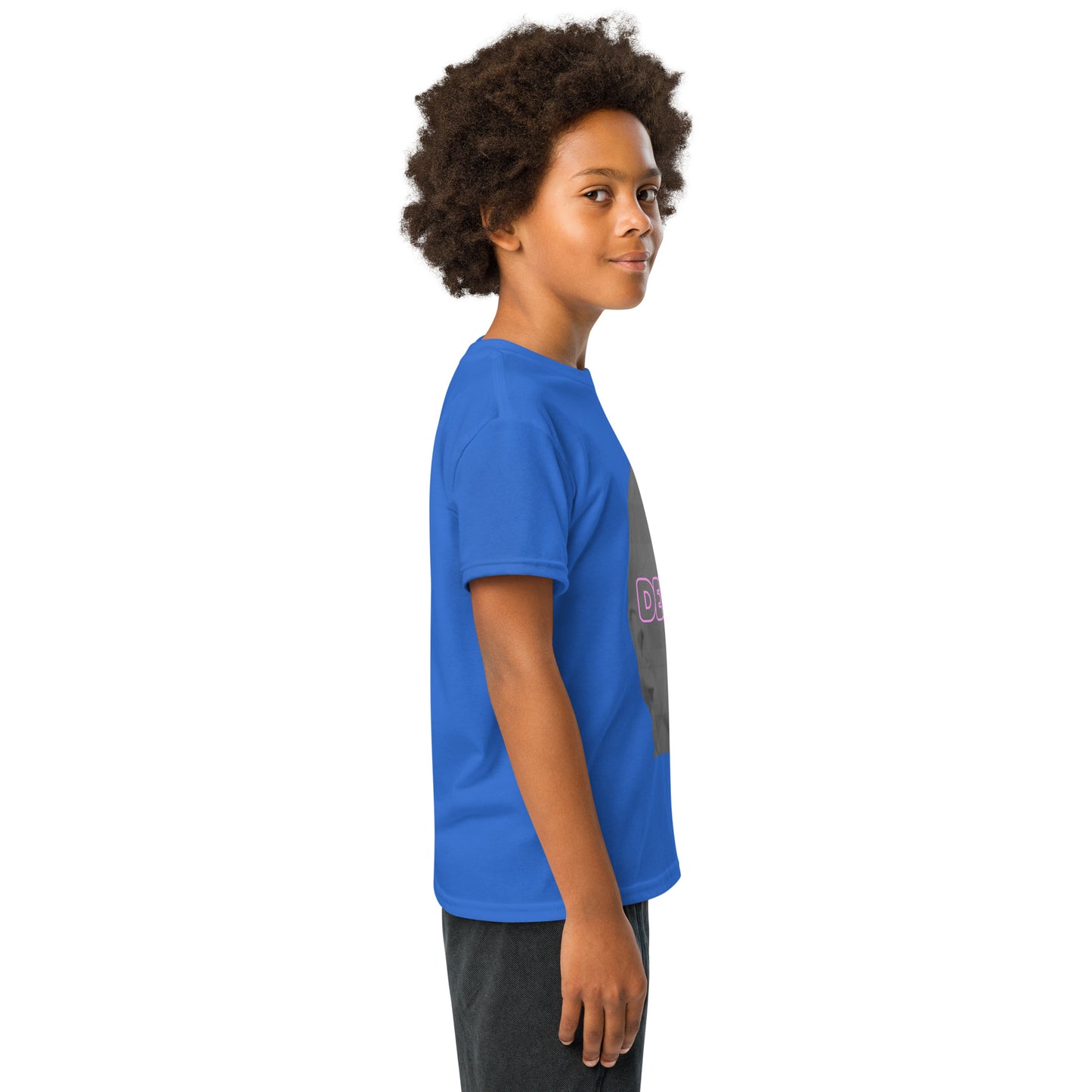 Right side view of royal blue Delulu tee on smiling kid, edge of pink "DELULU" print peeking